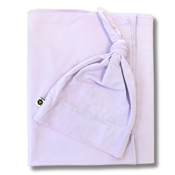 Bamboo Swaddles for Newborn Sleep: Why Stretch + Cooling Bamboo Beats Cotton Muslin