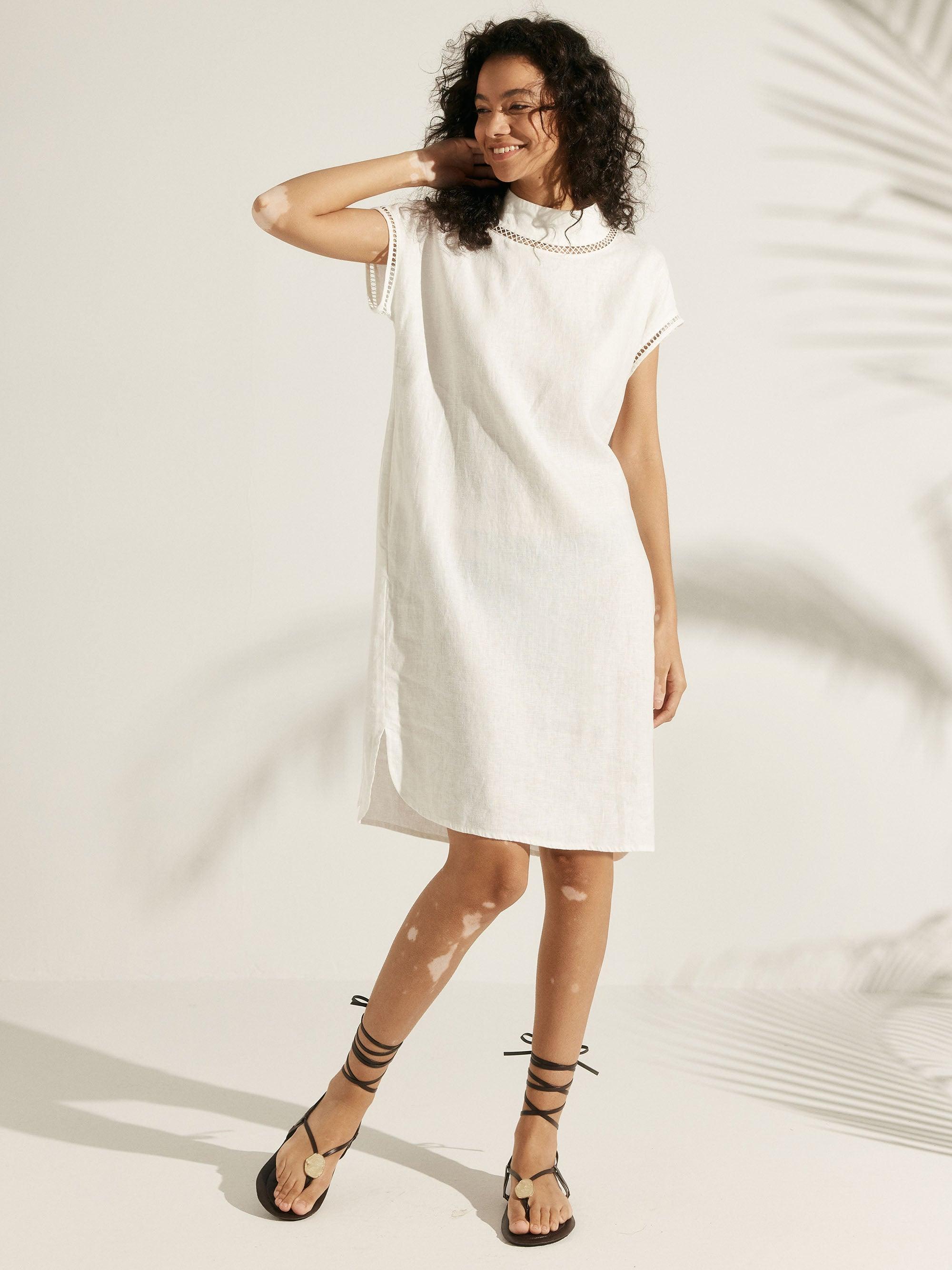 LINTICO LINTICO 100% Linen Cutout Turtleneck Mini Dress ZAHRA — lifestyle worn / used context
