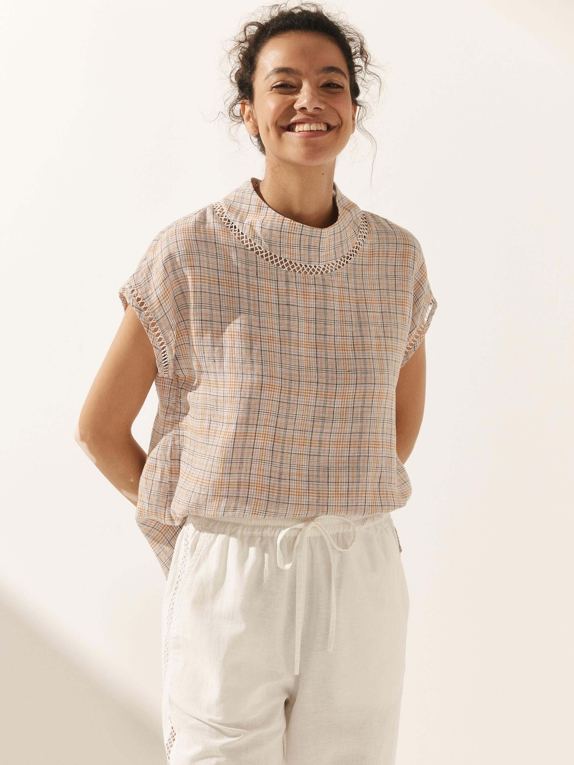 LINTICO Linen Cutout Turtleneck Top QUINN — feature highlight