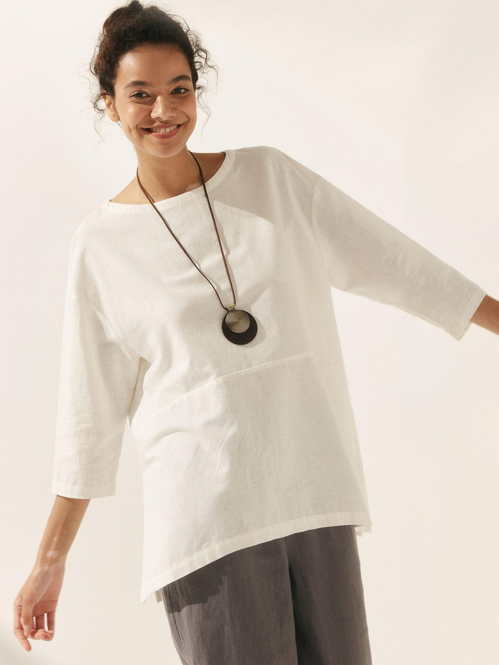 LINTICO Linen White Boat Neck Oversized Top AVA — lifestyle worn / used context