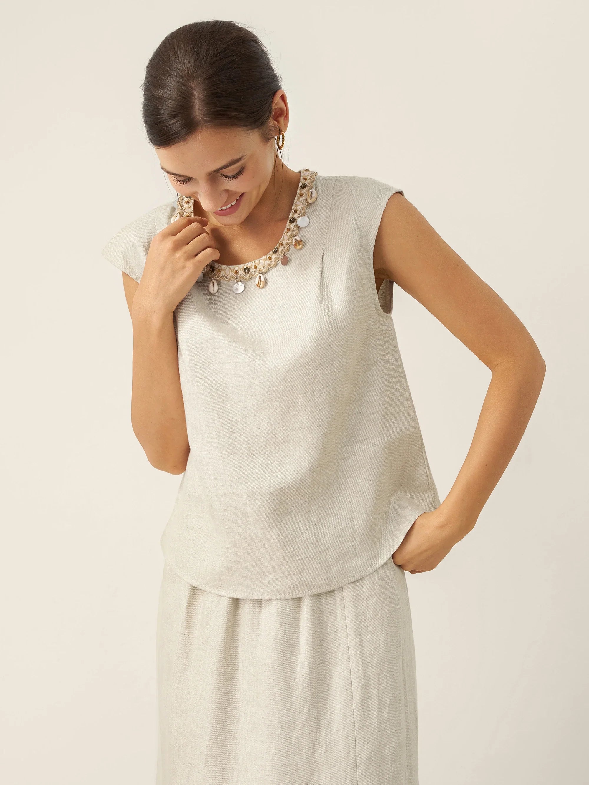 LINTICO LINTICO 100% Linen Cap Sleeve Beaded Top BIANCA — LINTICO branding close-up