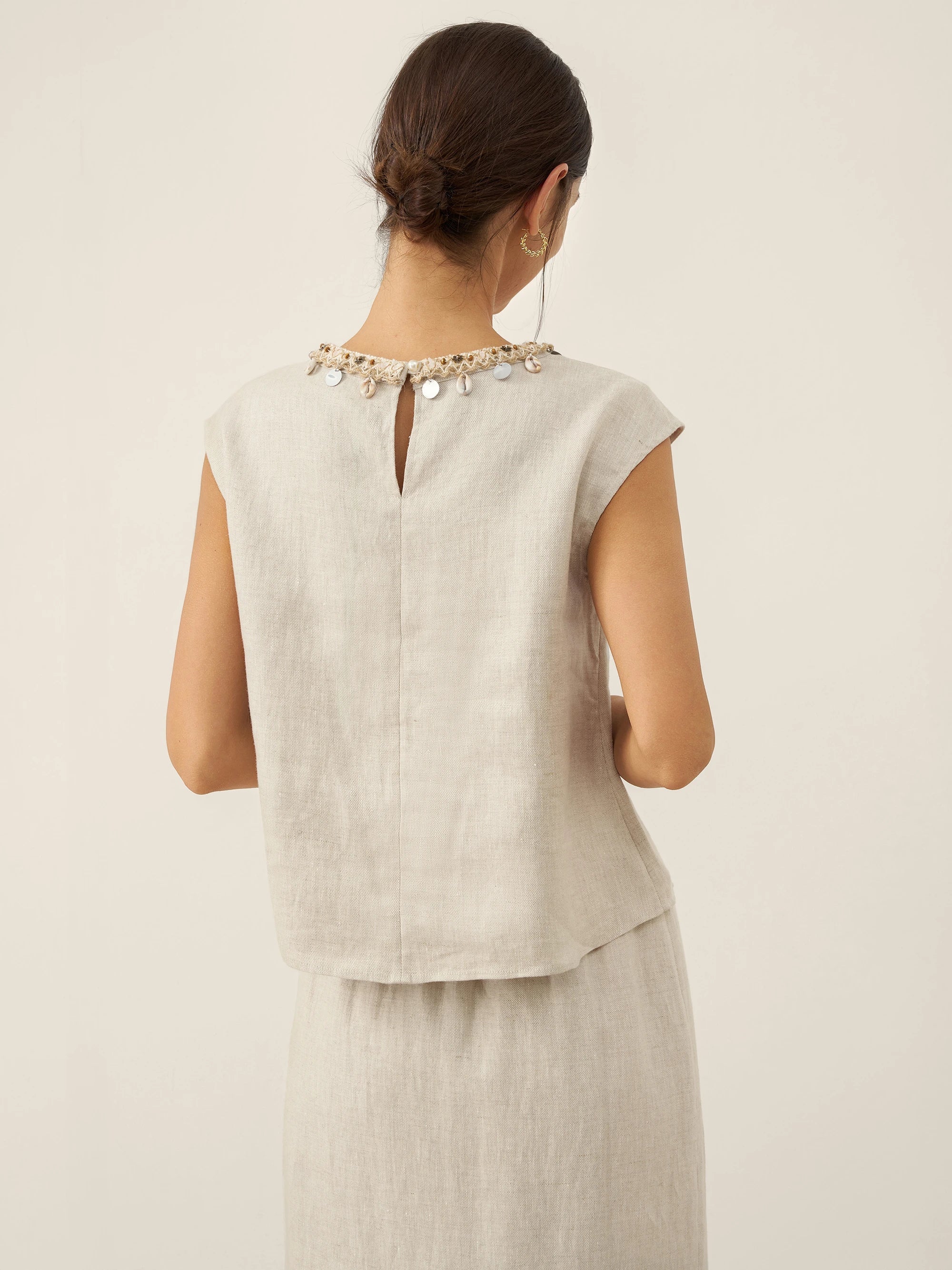 LINTICO LINTICO 100% Linen Cap Sleeve Beaded Top BIANCA — lifestyle worn / used context