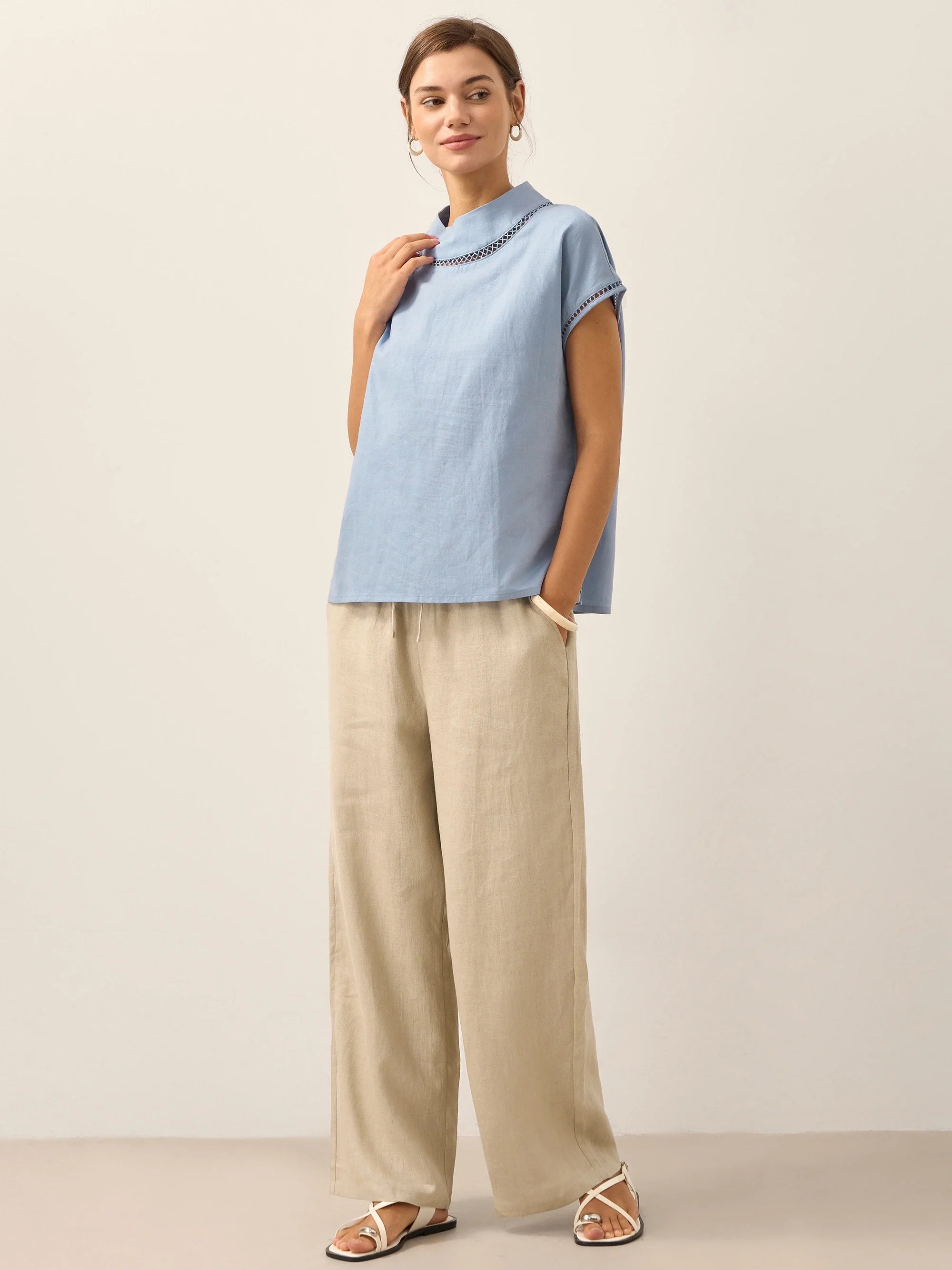 LINTICO Linen Cutout Turtleneck Top QUINN — packaging