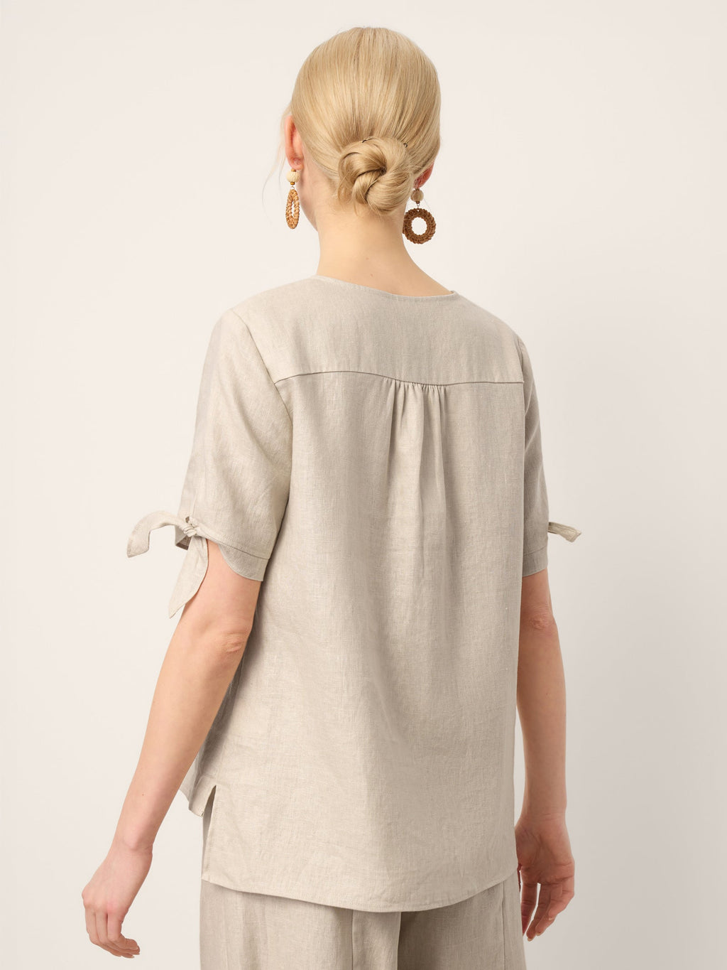 LINTICO 100% Linen Tie Cuff Notched V-Neck Top LORAN — LINTICO branding close-up