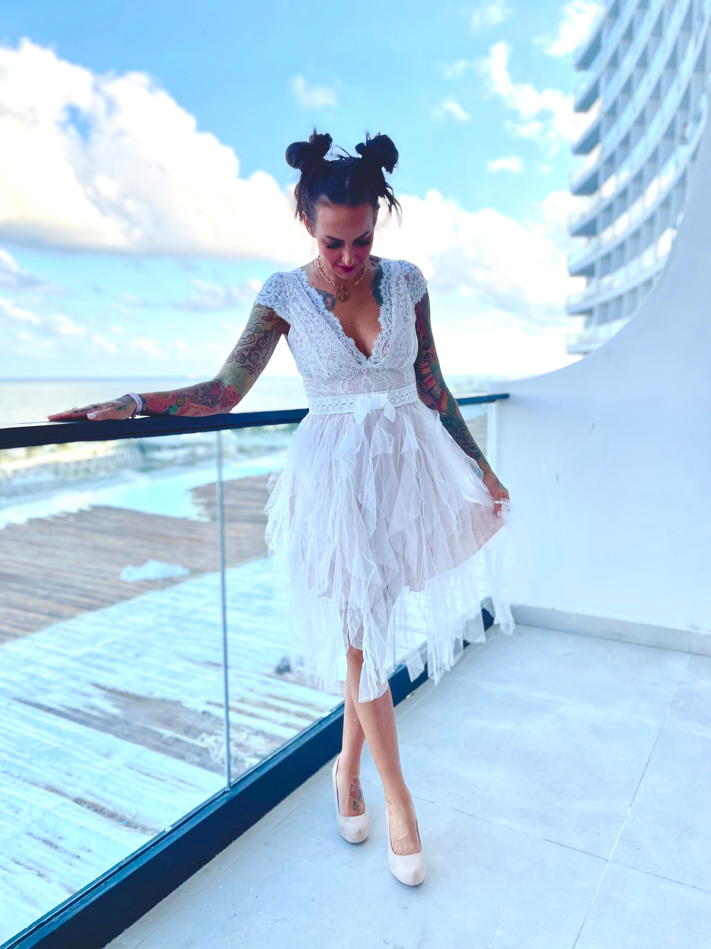 Pretty Little Patriot Lace White Party Dress — Pretty Little Patriot branding close-up
