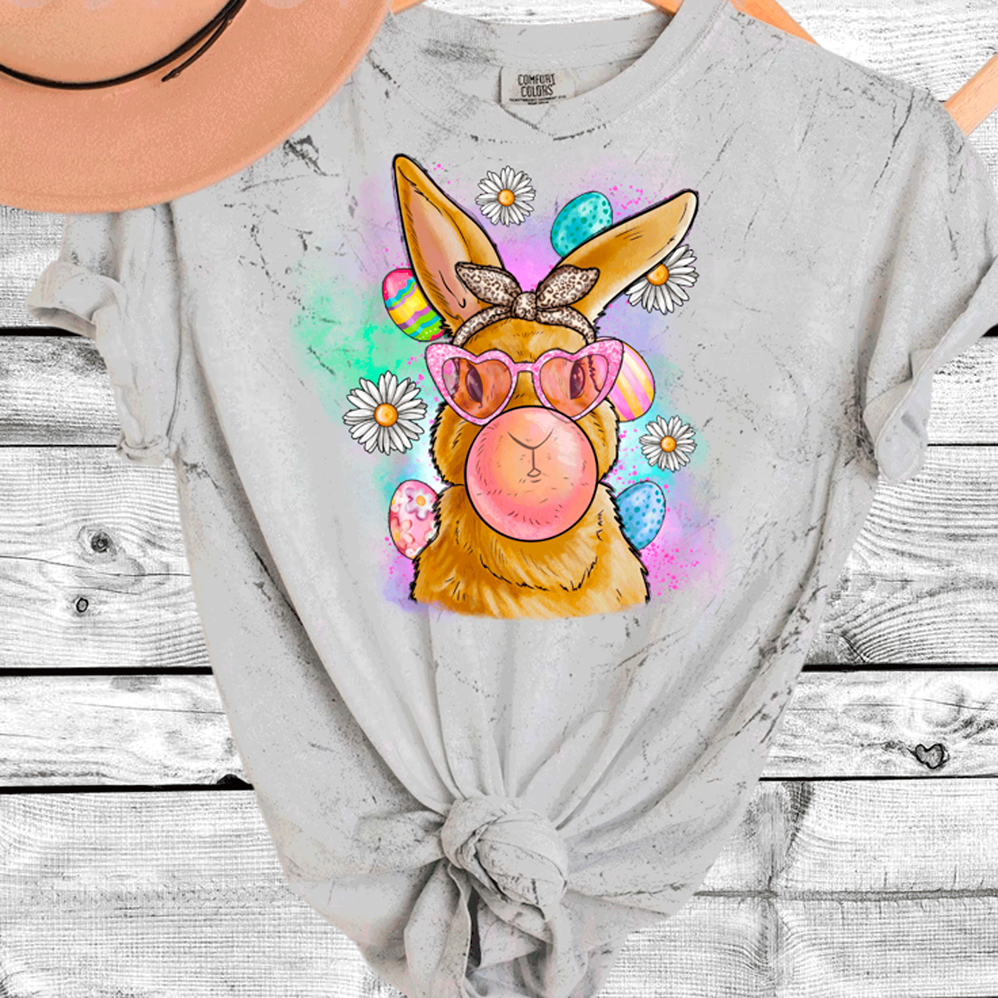 A Blessed Texas Mess Boutique Comfort Color Colorblast Tie Dye Fun Bubble Blowing Bunny — lifestyle worn / used context