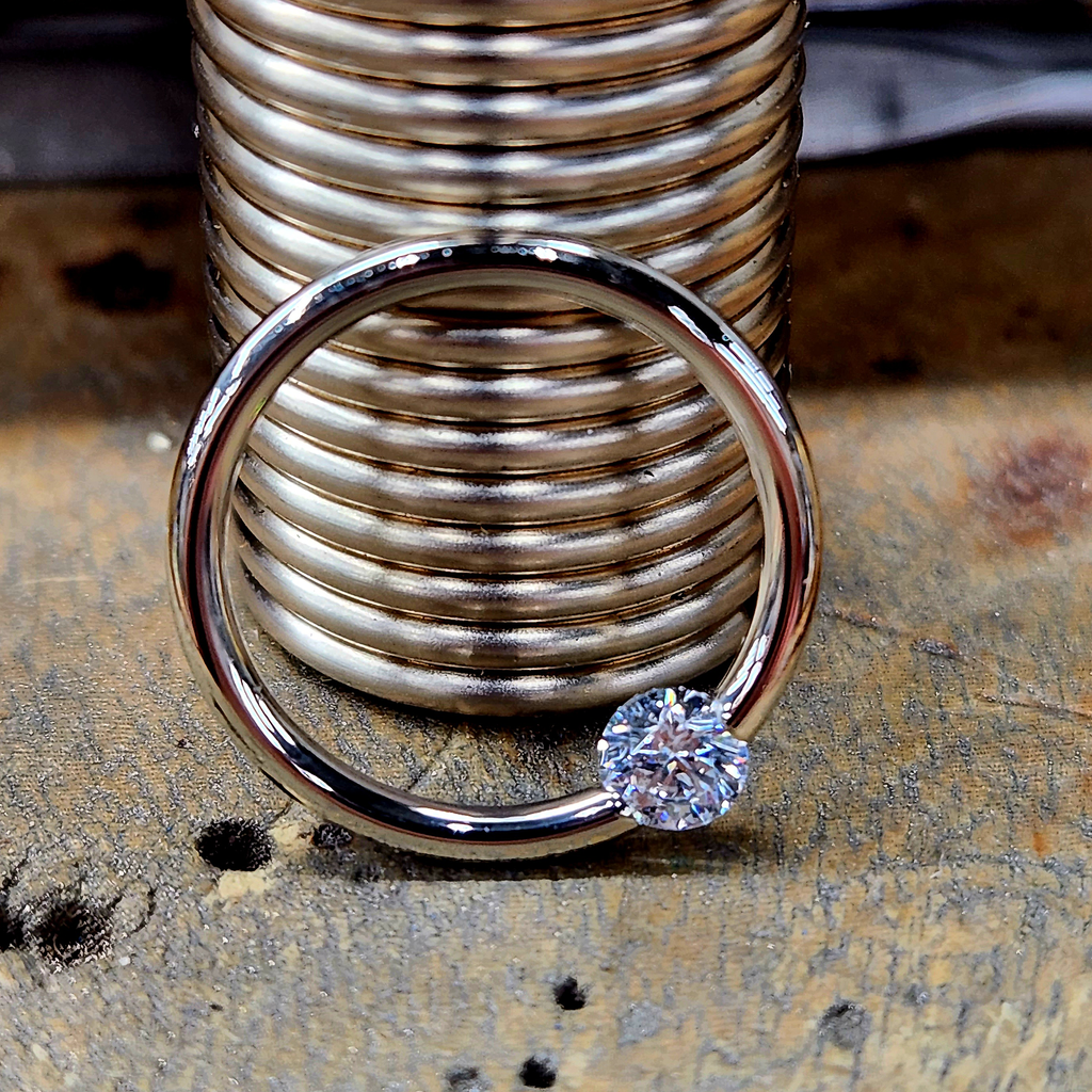 BodyCandy 16G 3/8 Solid 14k Yellow Gold 3mm Clear Cubic Zirconia Tension Captive Ring — alternative angle