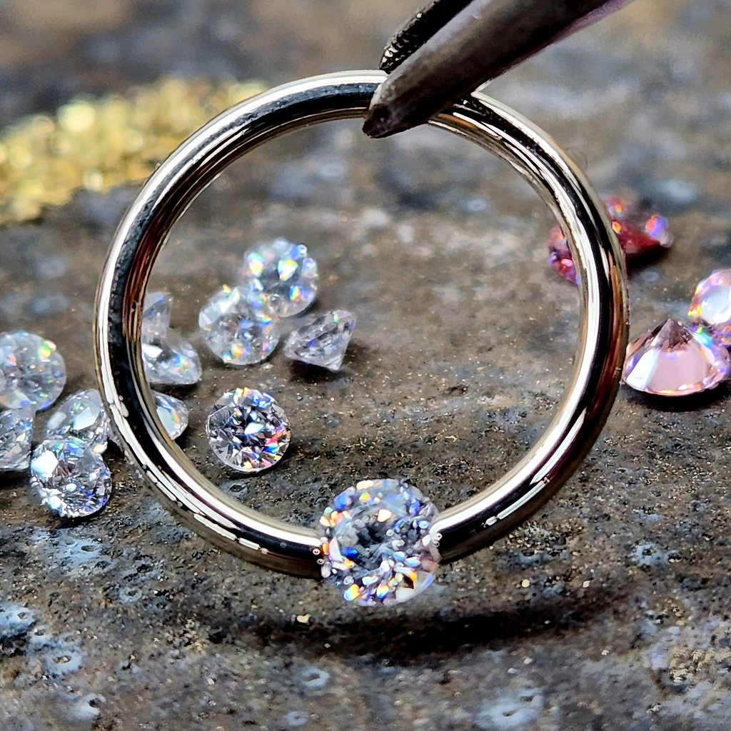 BodyCandy 16G 3/8 Solid 14k Yellow Gold 3mm Clear Cubic Zirconia Tension Captive Ring — detail close-up