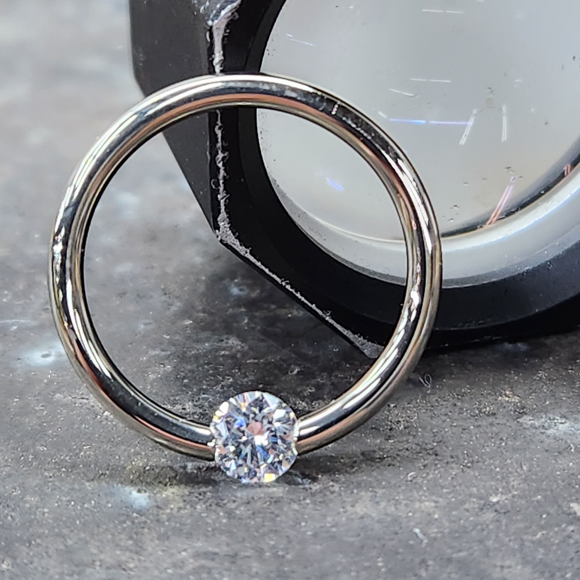BodyCandy 16G 3/8 Solid 14k Yellow Gold 3mm Clear Cubic Zirconia Tension Captive Ring — back view