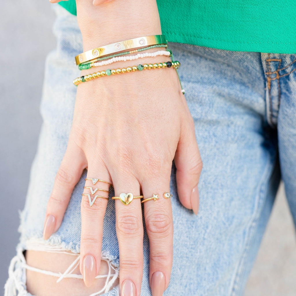 KADOU BOUTIQUE Heart Twist Ring — detail close-up