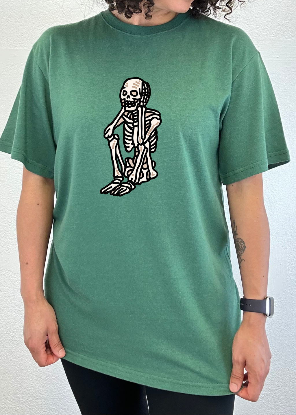 Spun Bamboo Sad Skeleton Halloween Unisex Bamboo Viscose/Organic Cotton Short Sleeve Graphic T-Shirt — lifestyle context