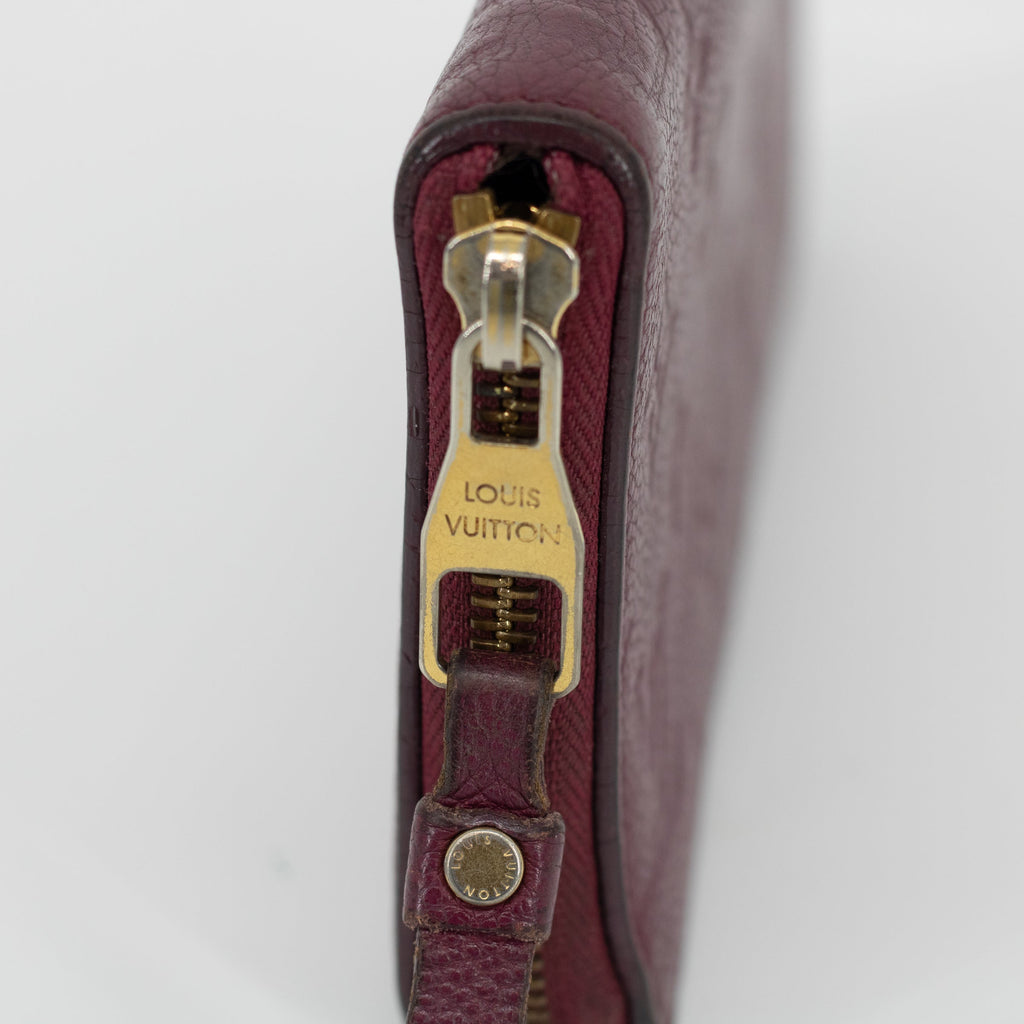 Bolt Boutique Louis Vuitton Empriente Zippy Aurore SP2182 Wallet #1828 — Bolt Boutique branding close-up