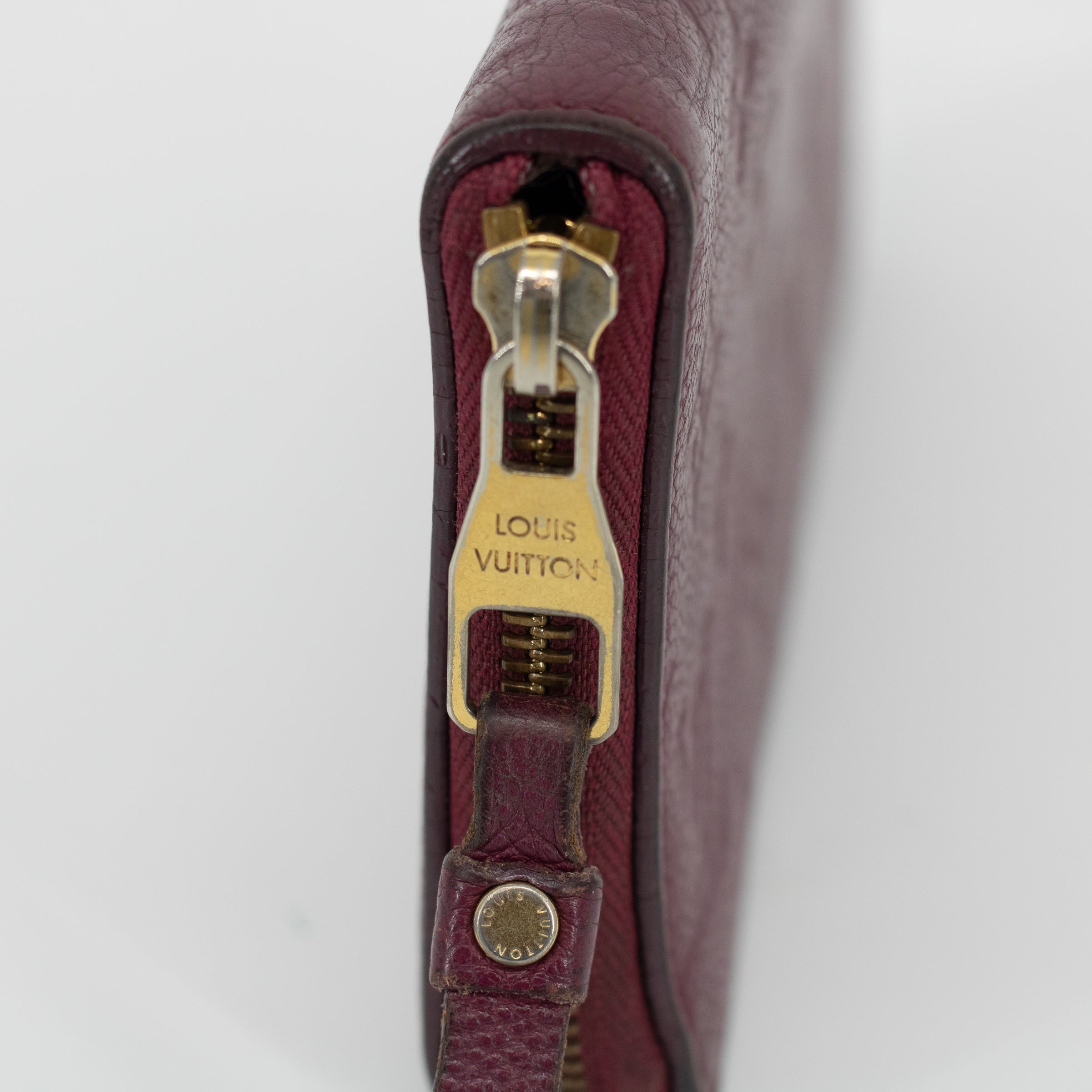 Bolt Boutique Louis Vuitton Empriente Zippy Aurore SP2182 Wallet #1828 — Bolt Boutique branding close-up