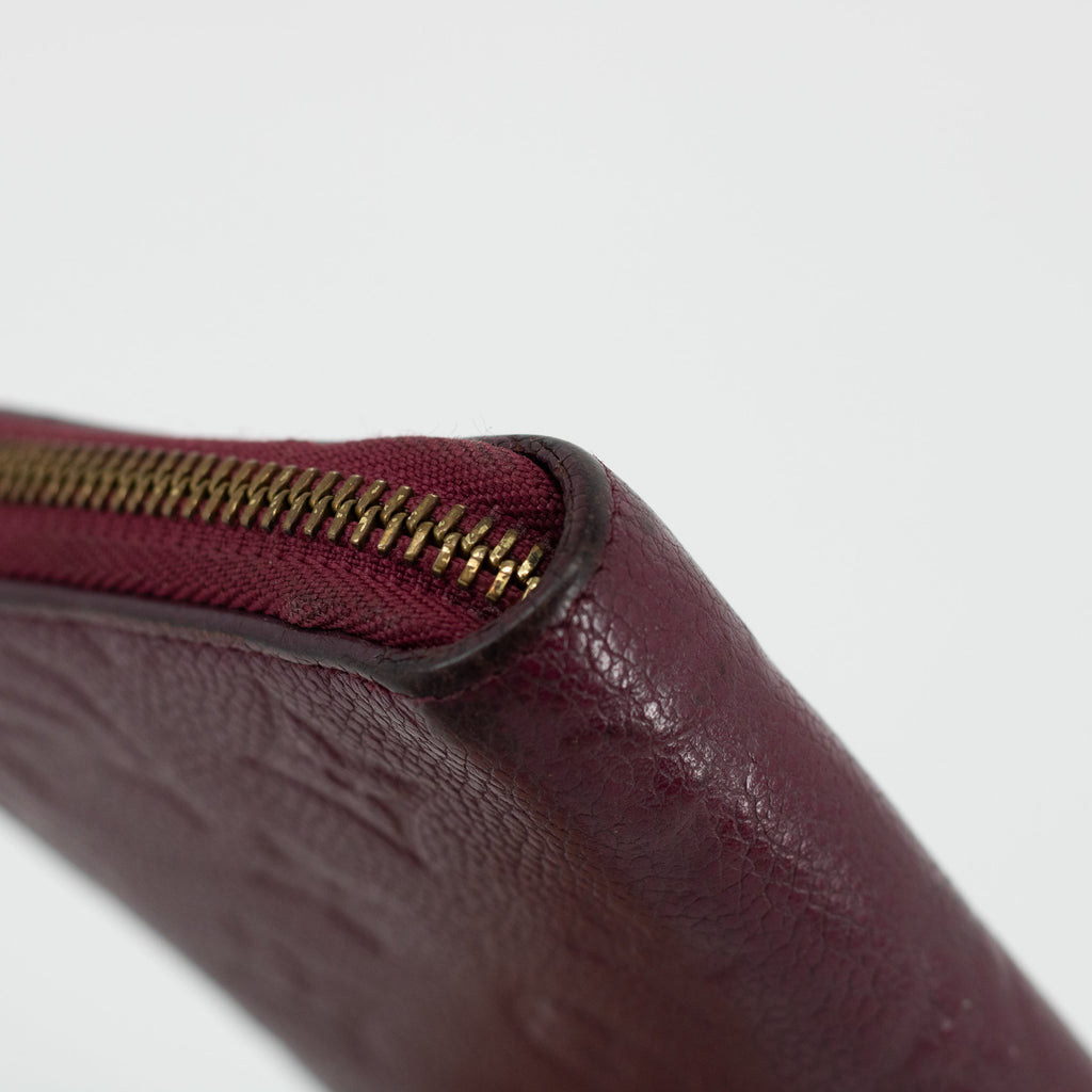 Bolt Boutique Louis Vuitton Empriente Zippy Aurore SP2182 Wallet #1828 — lifestyle worn / used context