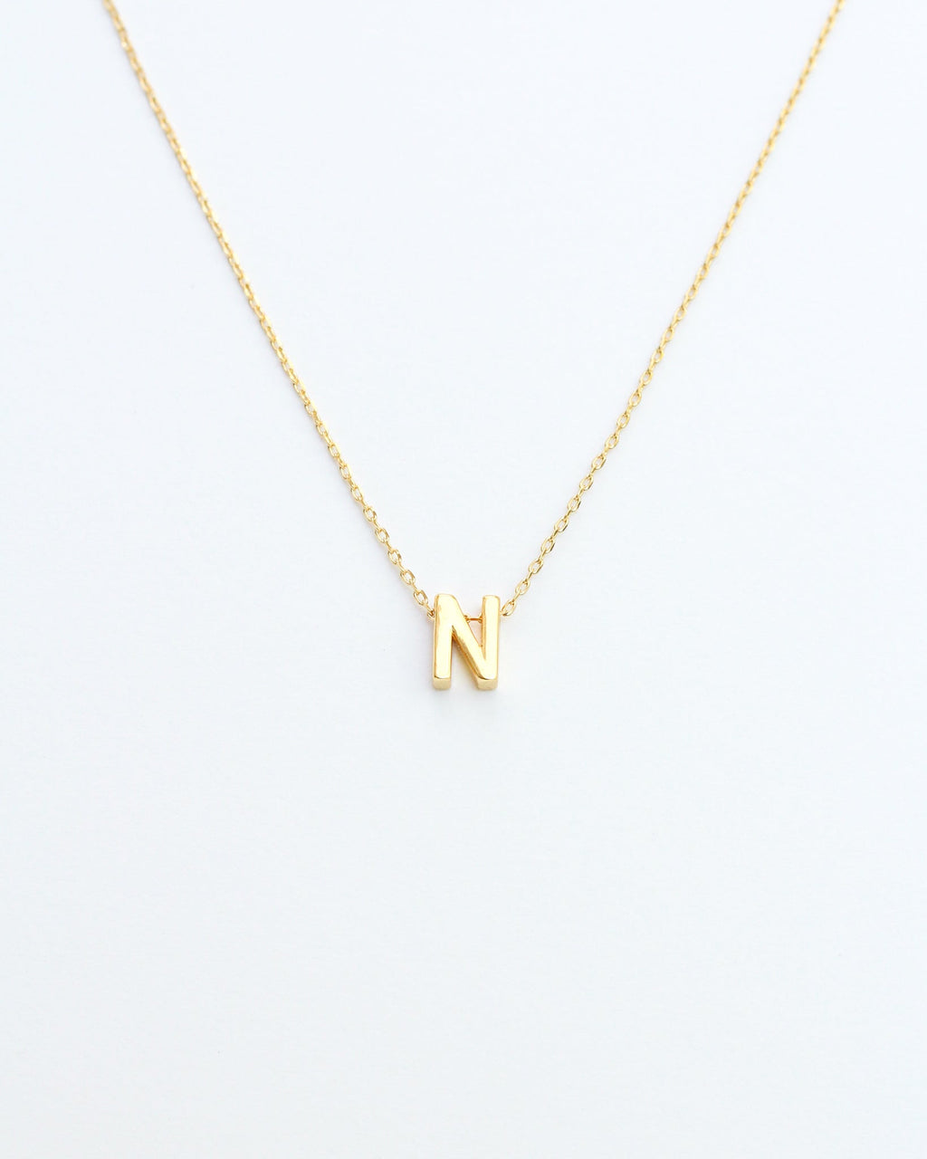 KADOU BOUTIQUE Gold Block Letter Initial Necklace — product on model