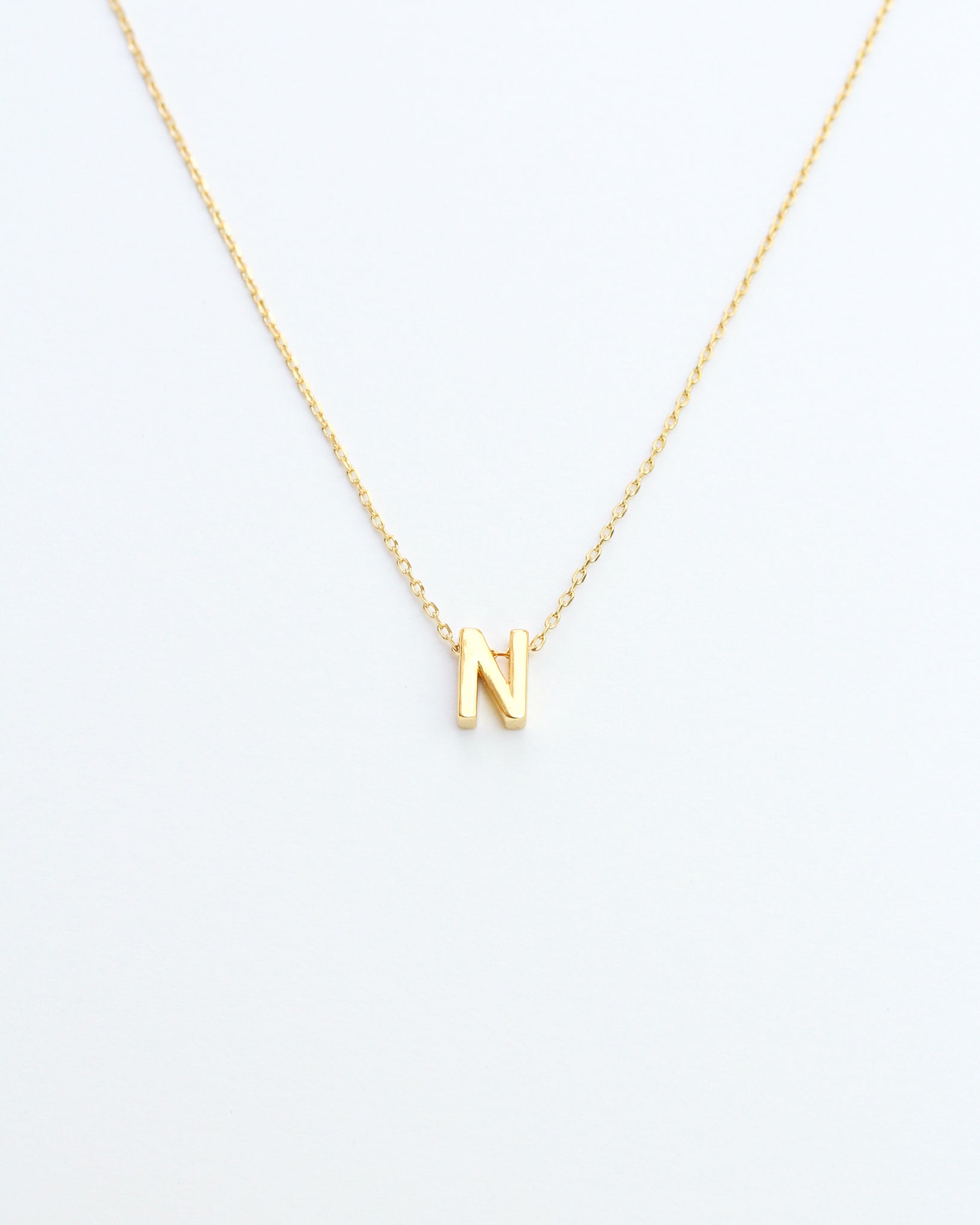 KADOU BOUTIQUE Gold Block Letter Initial Necklace — product on model