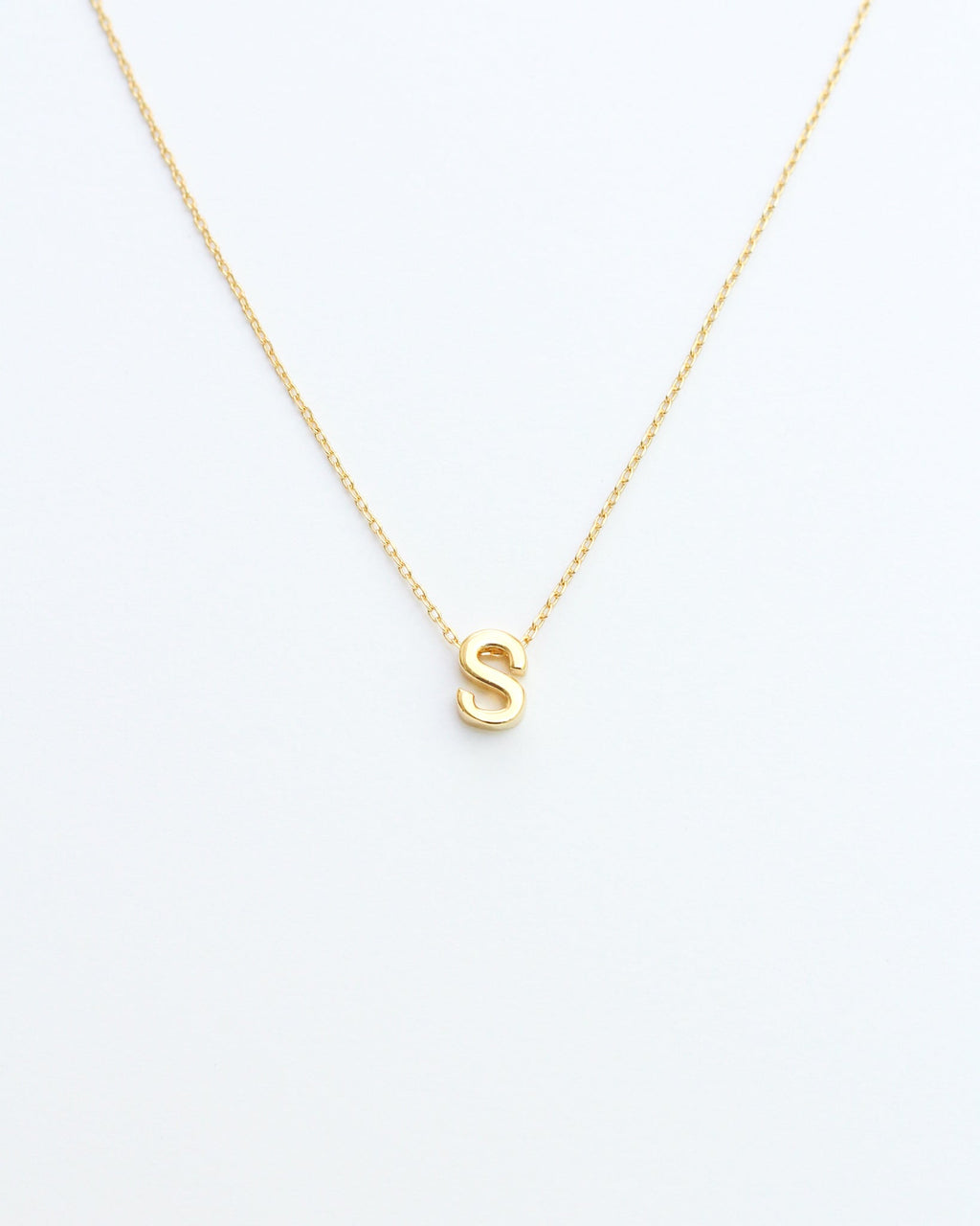 KADOU BOUTIQUE Gold Block Letter Initial Necklace — detail close-up
