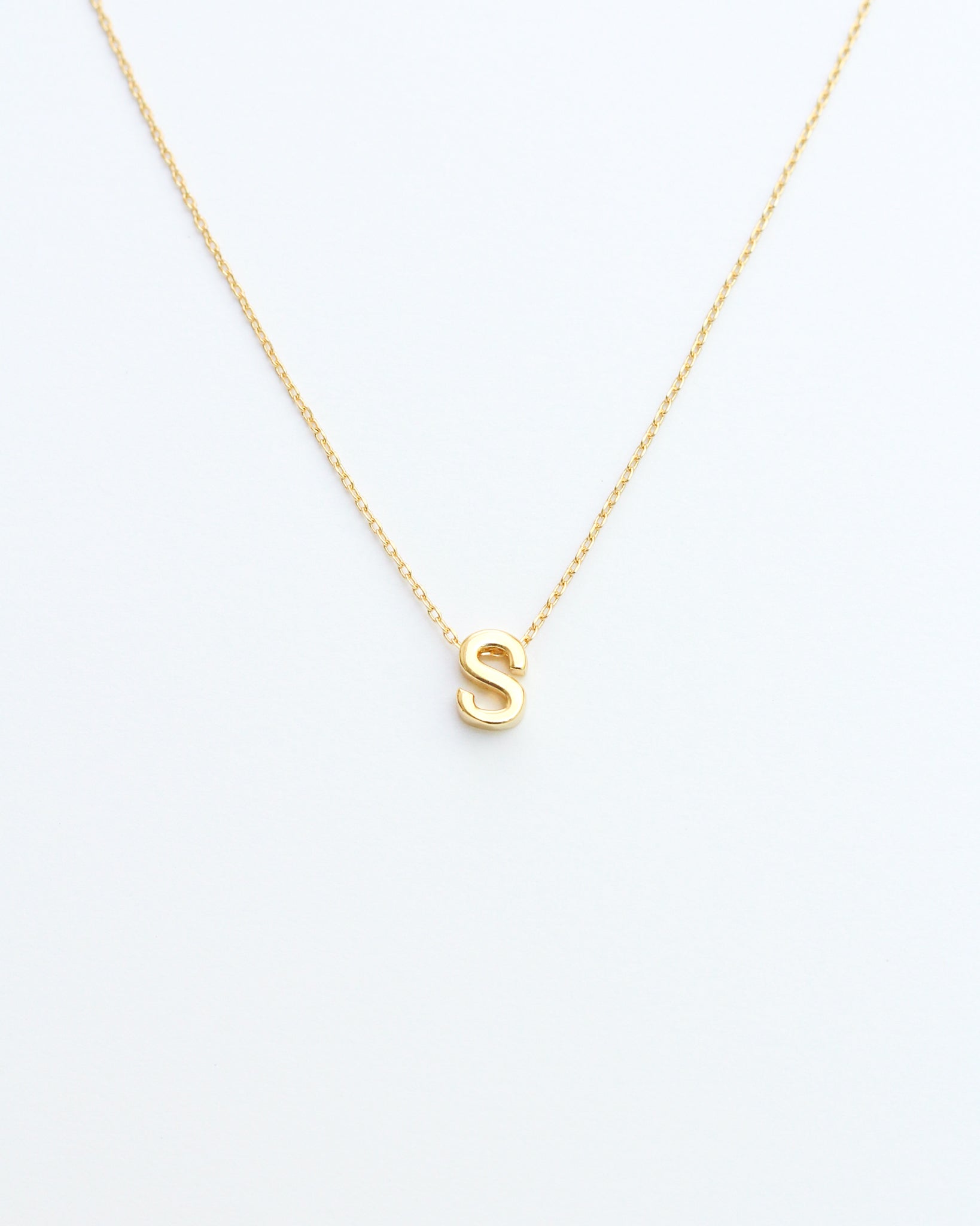 KADOU BOUTIQUE Gold Block Letter Initial Necklace — detail close-up