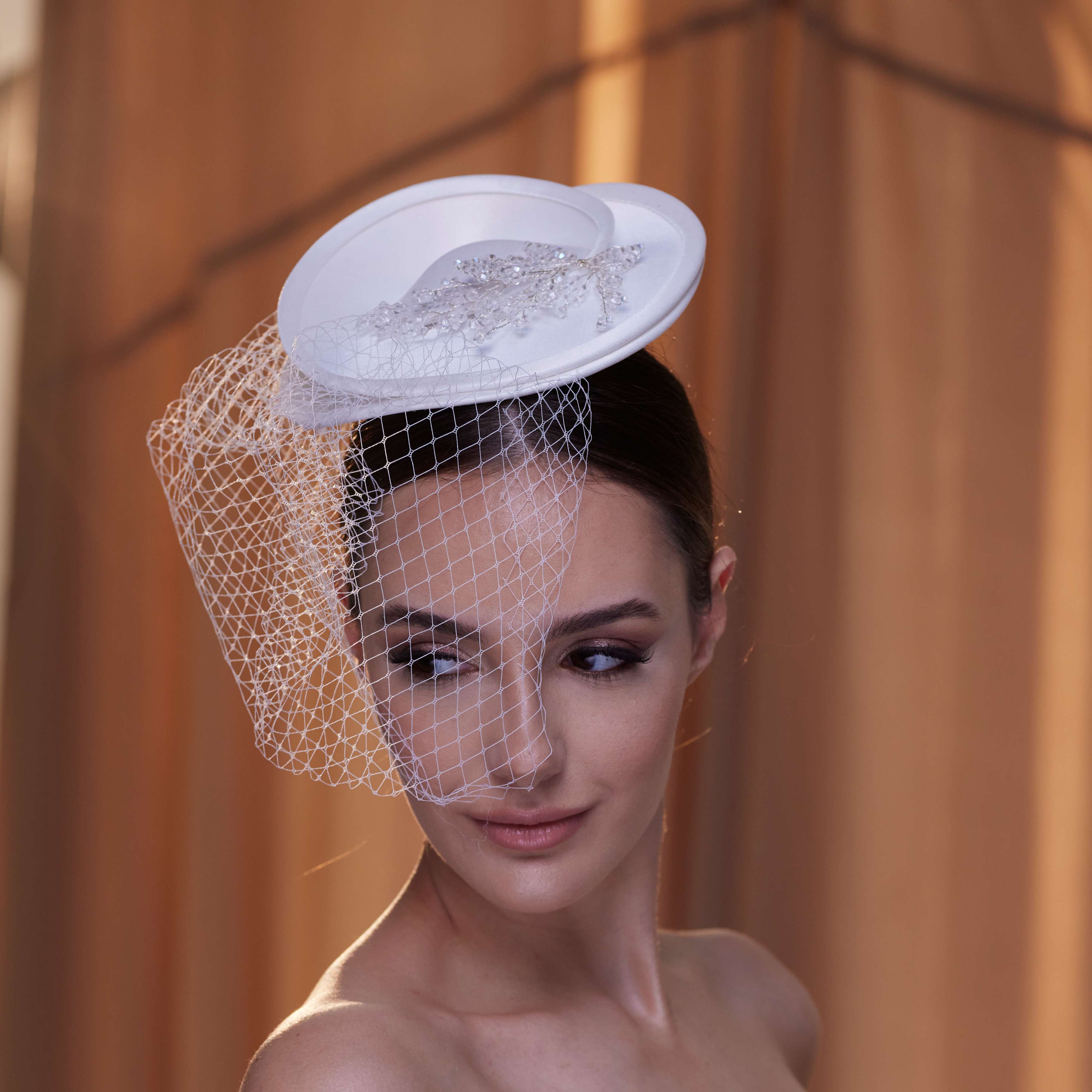 Elegant Bridal Fascinator with Beaded Details and Birdcage Veil – Bridal Port