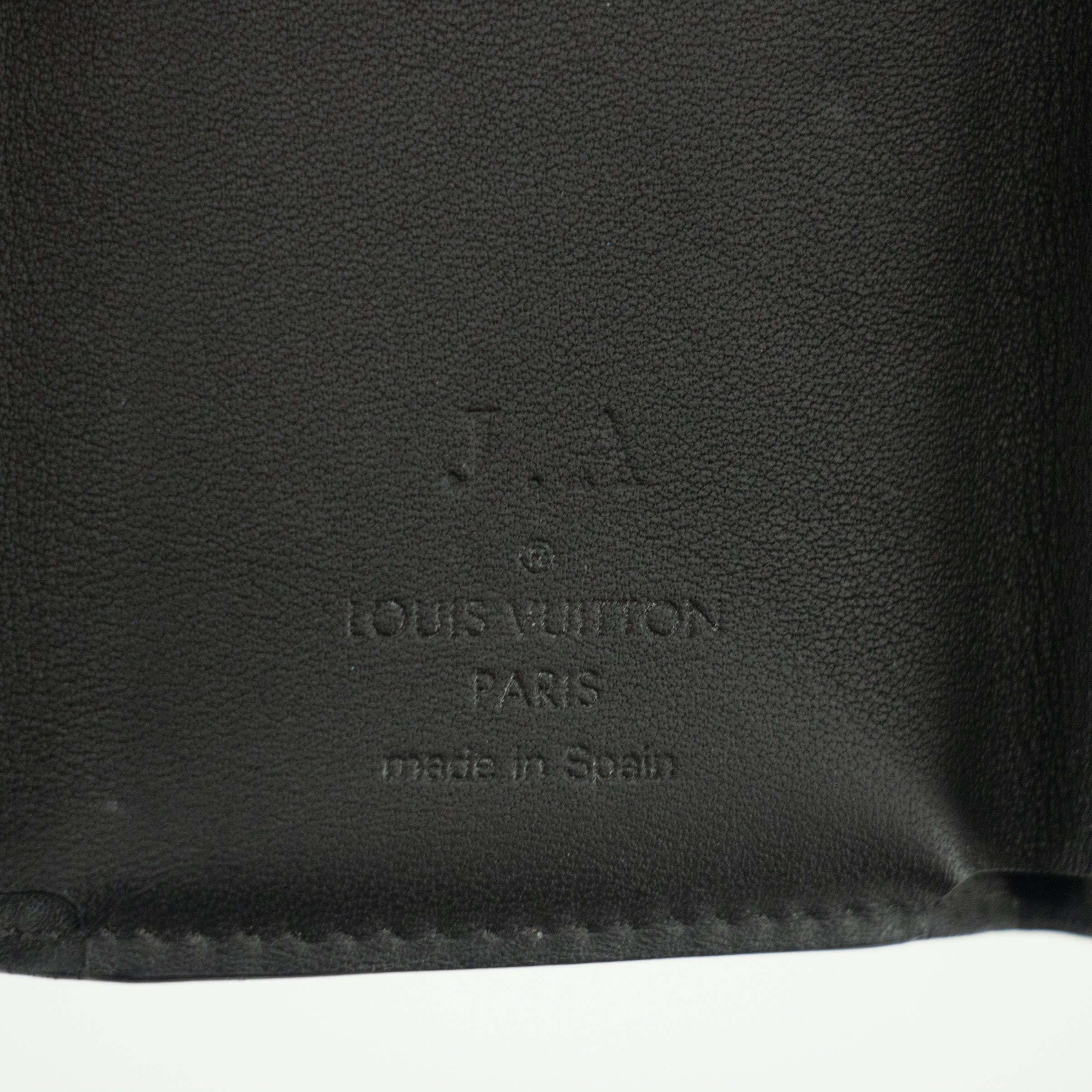 Bolt Boutique Louis Vuitton Monogram Eclipse Discovery Compact Wallet #1958 — in-use photo