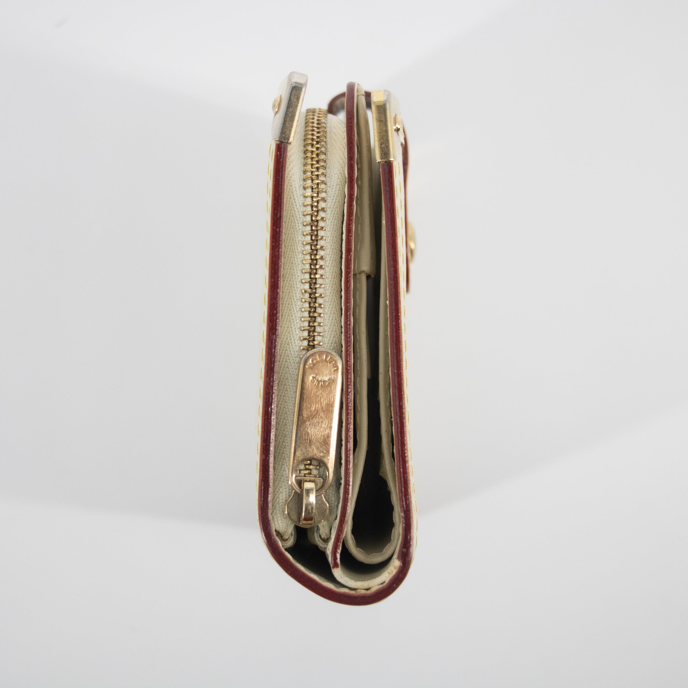 Bolt Boutique Louis Vuitton Ivory Suhali Compact Zippy Wallet  #2055 — lifestyle context