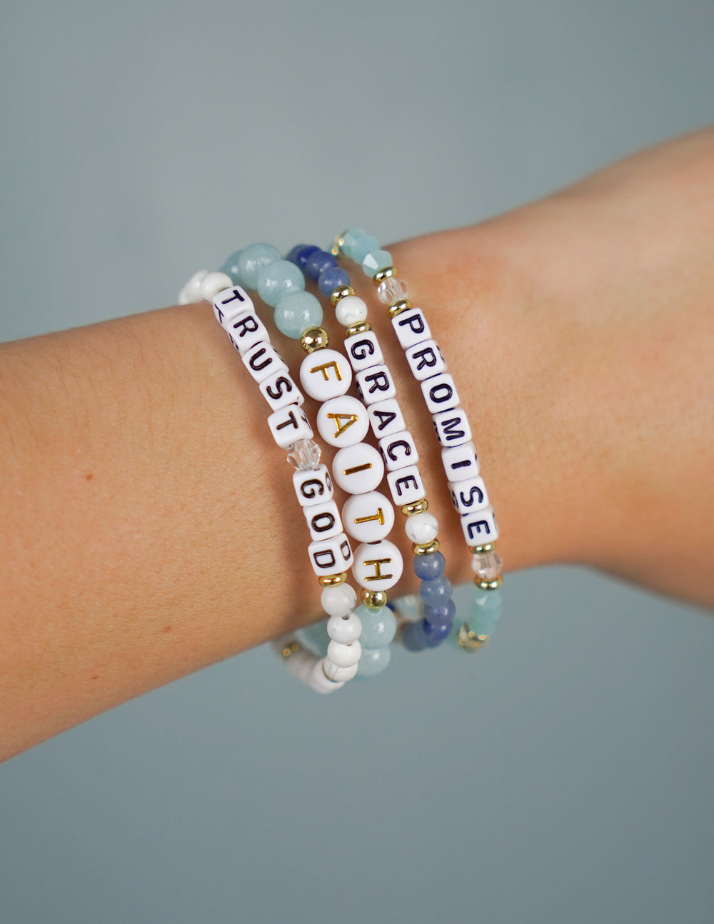 Elevated Faith Trust God Letter Bracelet — lifestyle context
