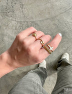Elevated Faith Mystery Ring — Elevated Faith branding close-up