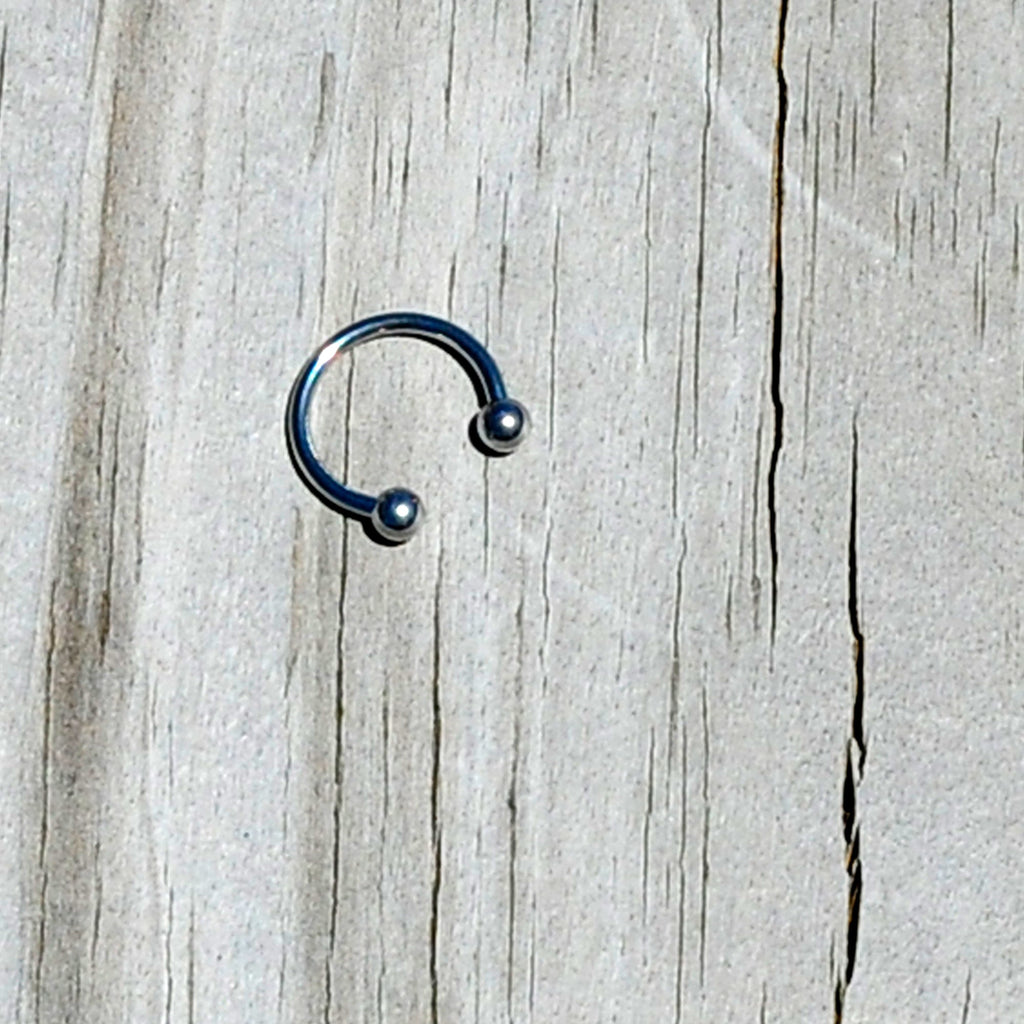 BodyCandy 16G 5/16 Stainless Steel Horseshoe Circular Barbell — lifestyle context