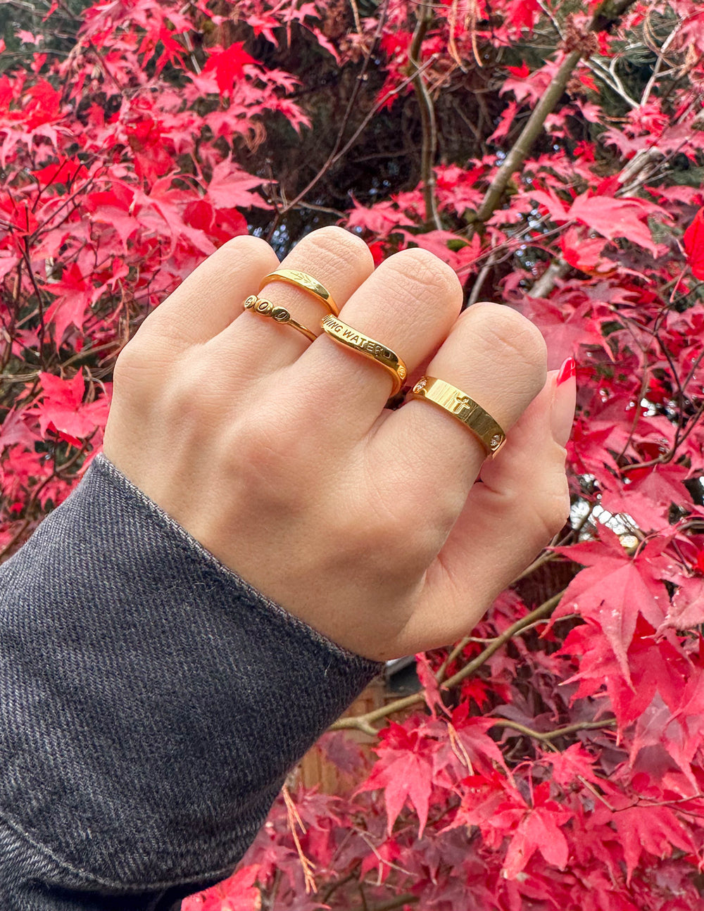 Elevated Faith Eternity Gem Ring — Elevated Faith branding close-up