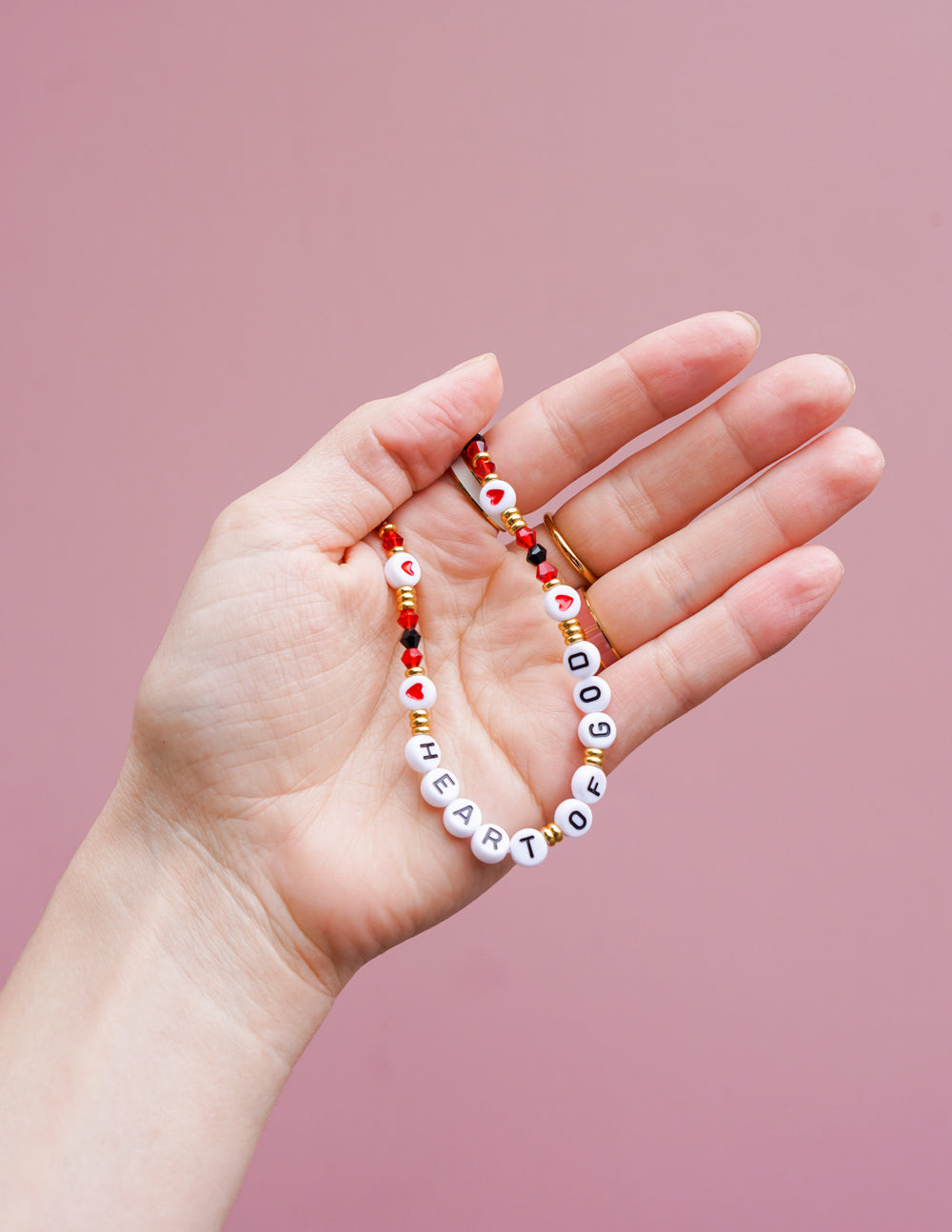 Elevated Faith Heart of God Phone Charm — lifestyle context