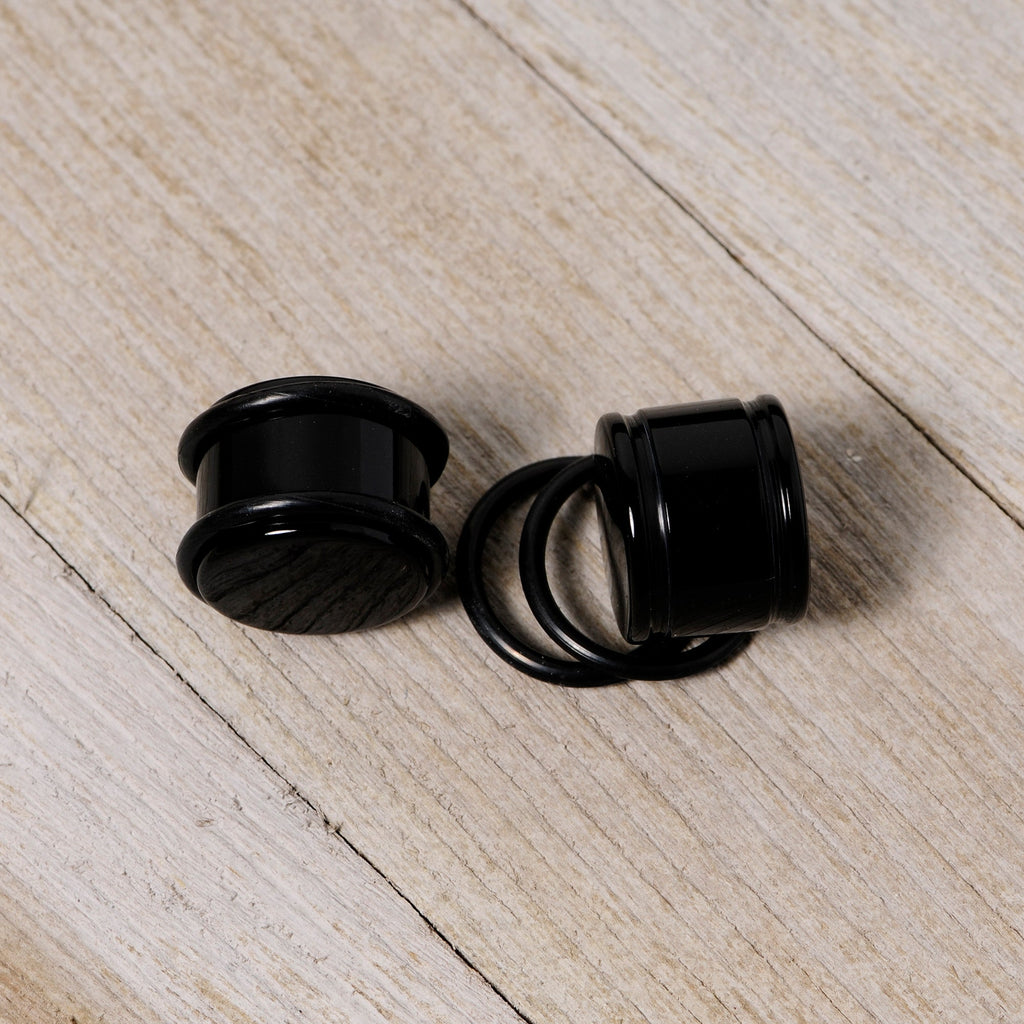 BodyCandy 5/8 Black Acrylic Straight Plug Set — in-use photo