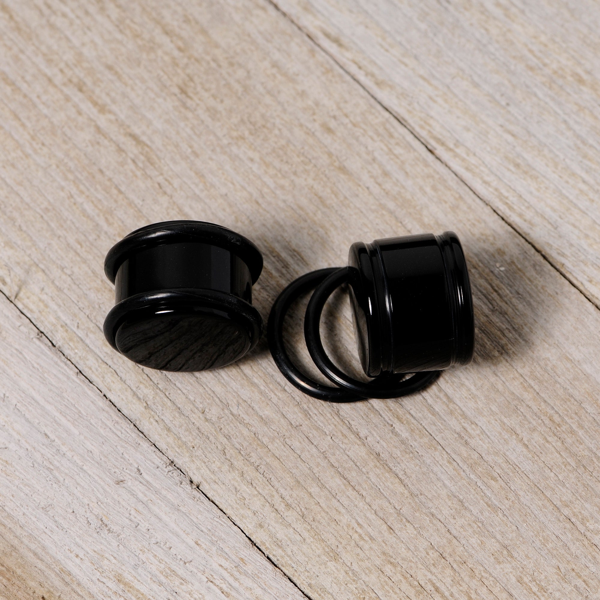 BodyCandy 5/8 Black Acrylic Straight Plug Set — in-use photo
