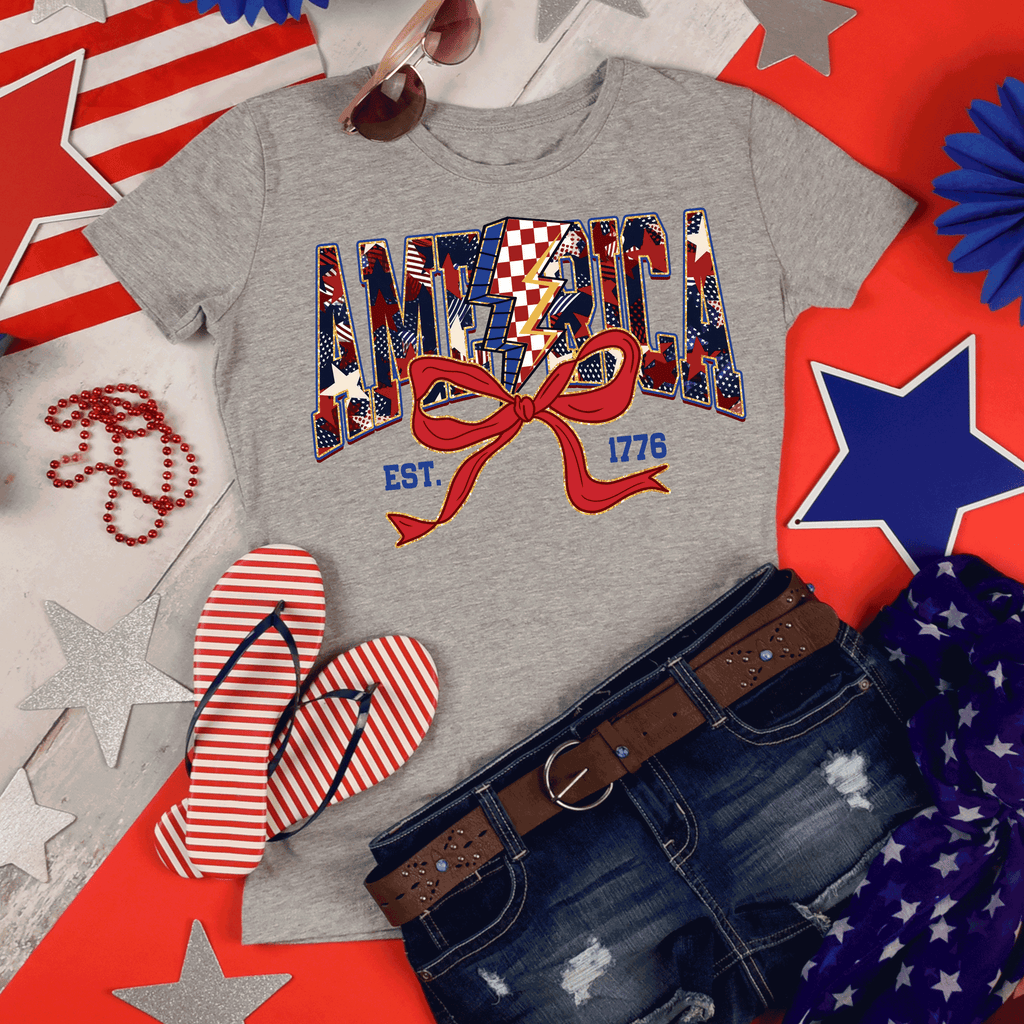 A Blessed Texas Mess Boutique America Est 1776, Checkered Lightning Bolt, 4th of july Coquette Bow Land of… — detail shot 7
