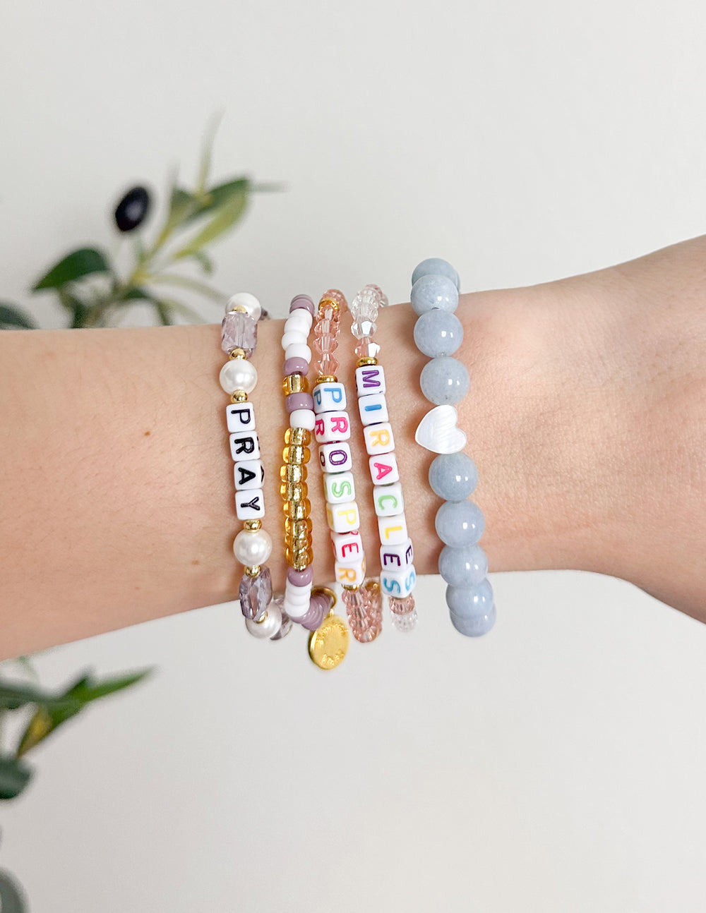 Elevated Faith Miracles Letter Bracelet — lifestyle context