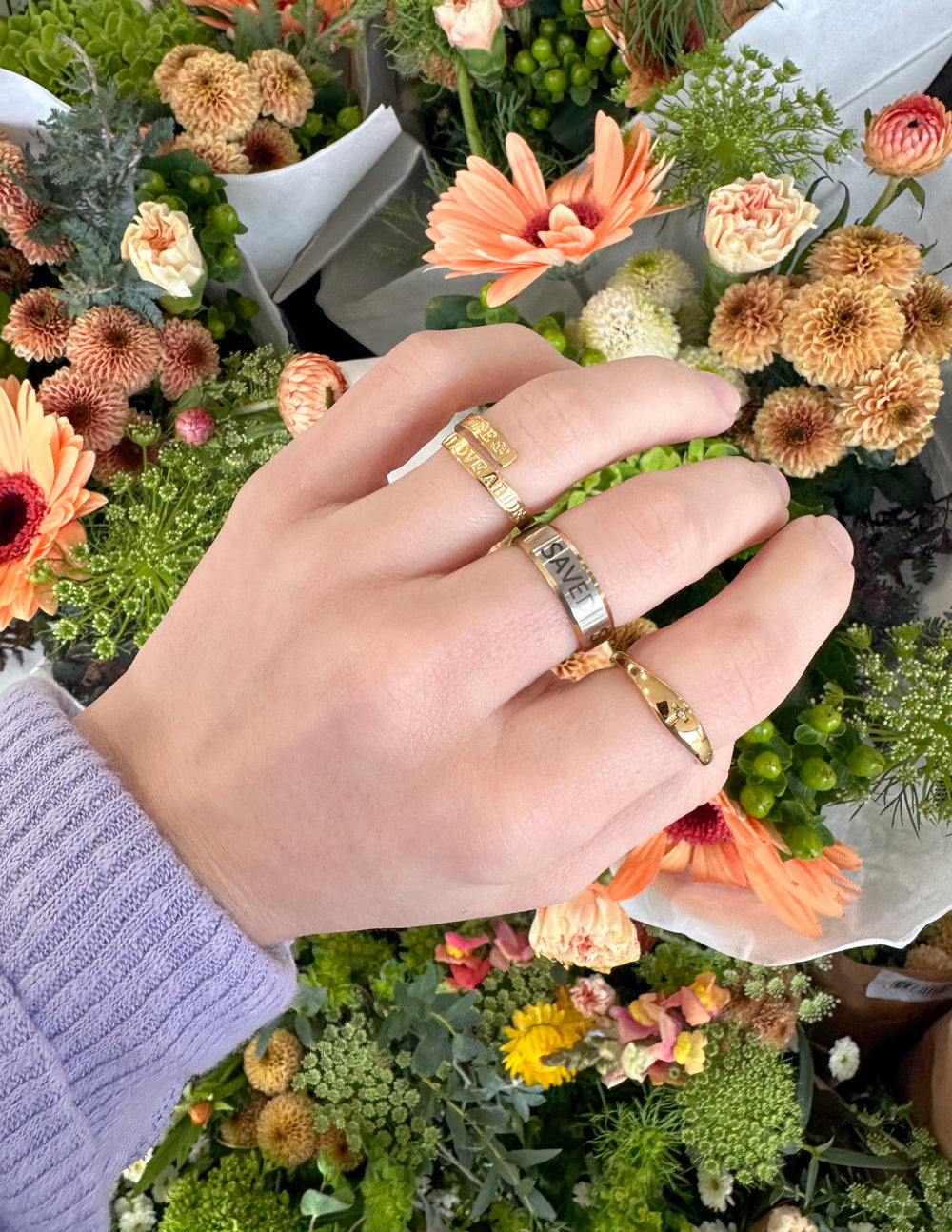 Elevated Faith Faith Hope Love Ring — detail close-up