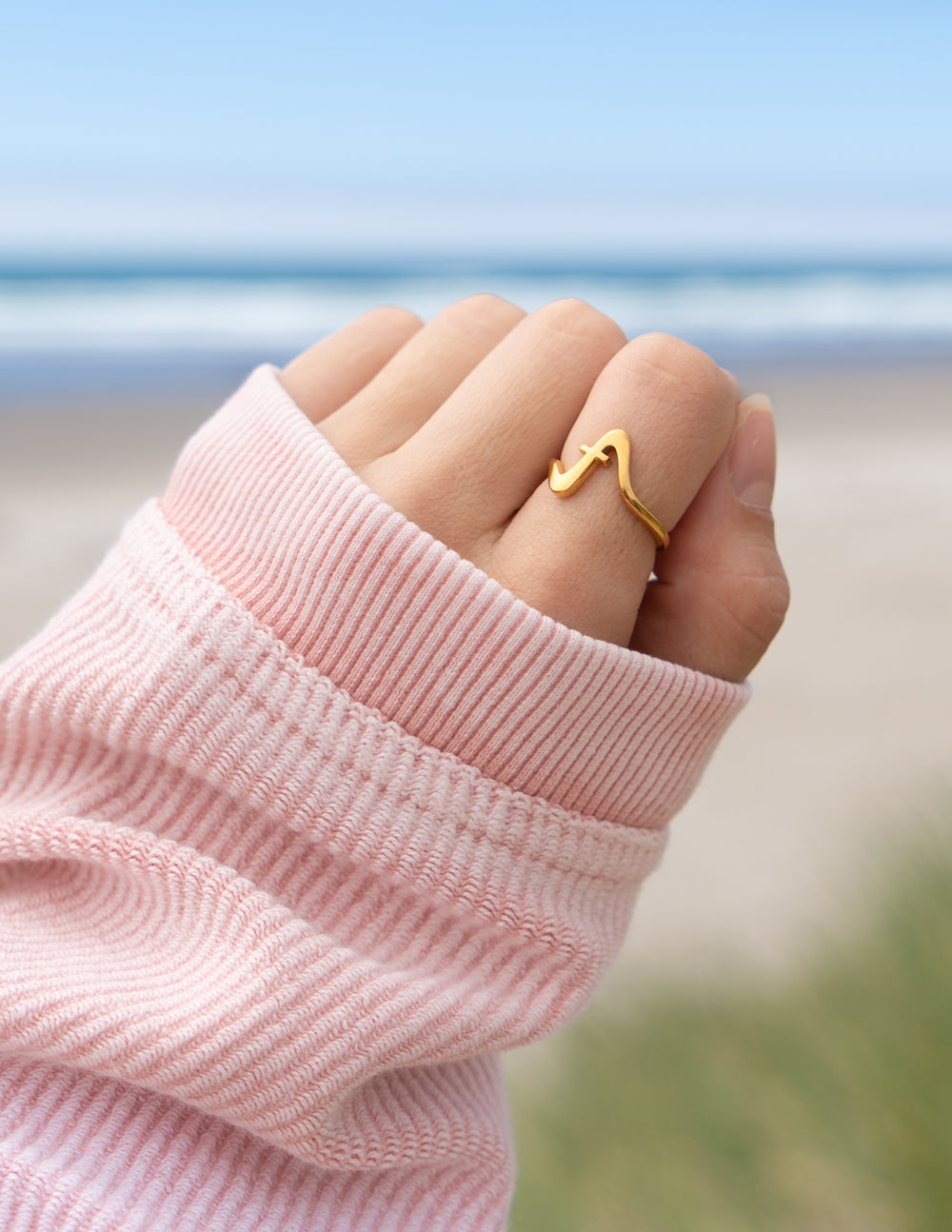 Elevated Faith Wavy Cross Ring — detail close-up