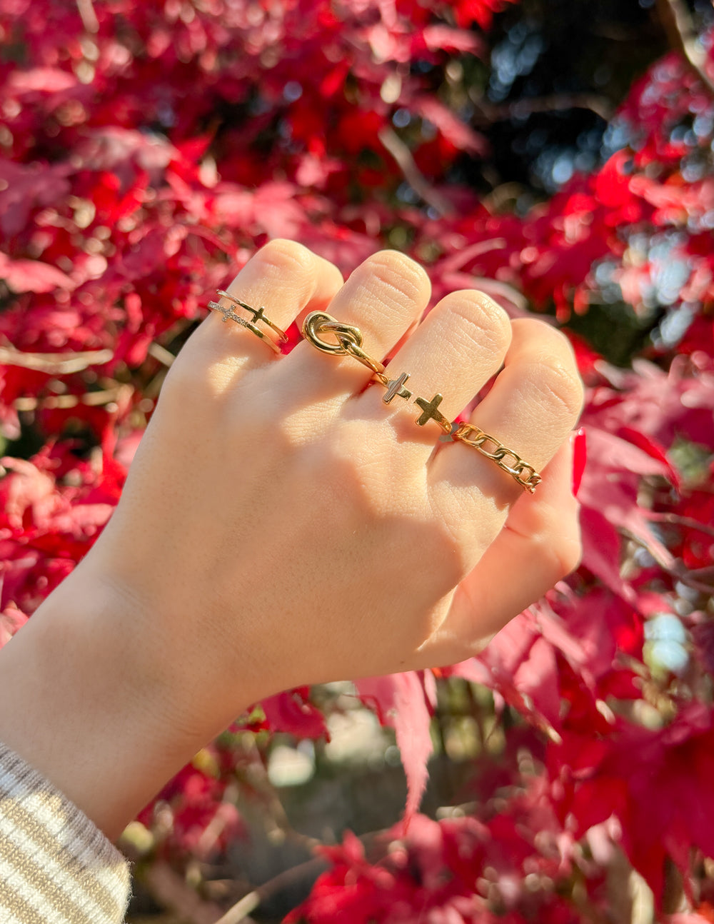 Elevated Faith Stacked Cross Gem Ring — Elevated Faith branding close-up