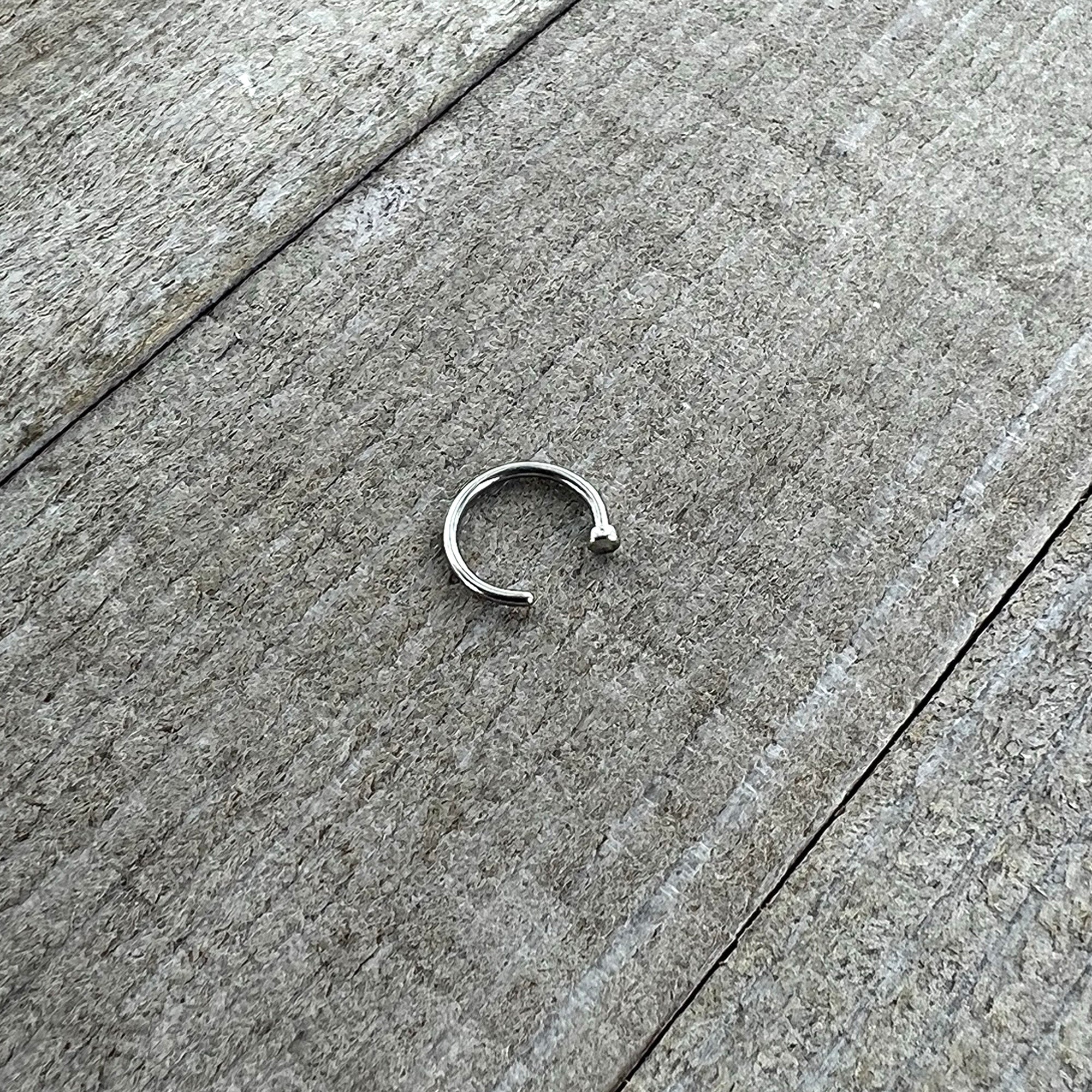 BodyCandy 18G 5/16 Stainless Steel Nose Hoop — in-use photo
