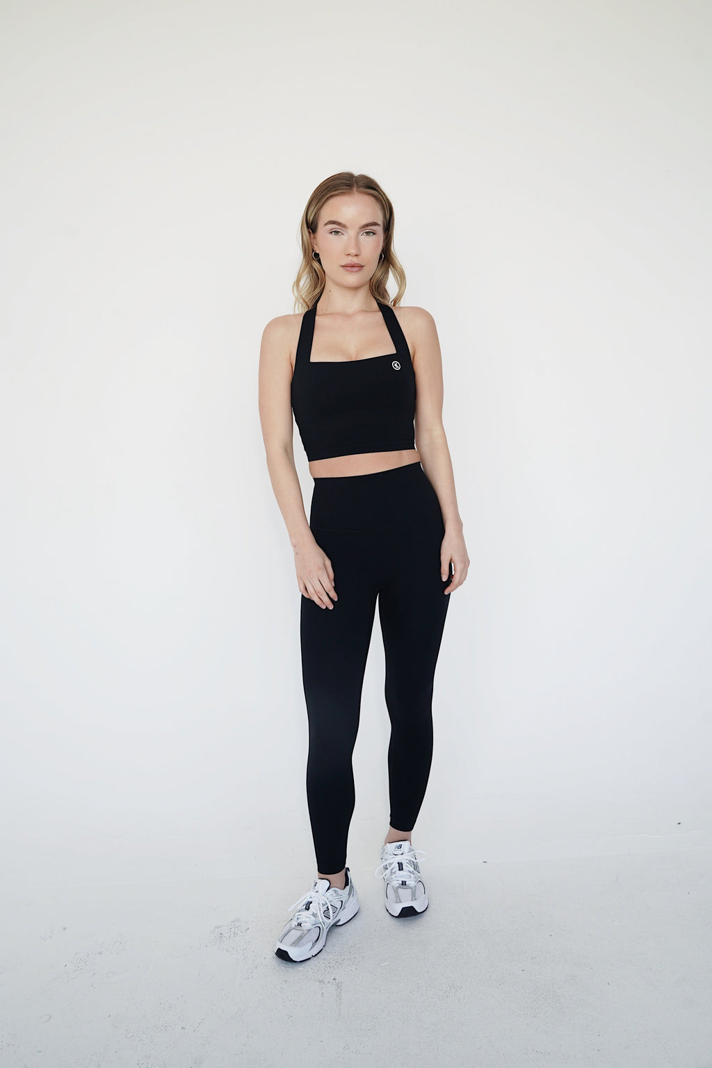 KIMITH BRAND I Am Wonderful High Rise Black Legging — KIMITH BRAND branding close-up