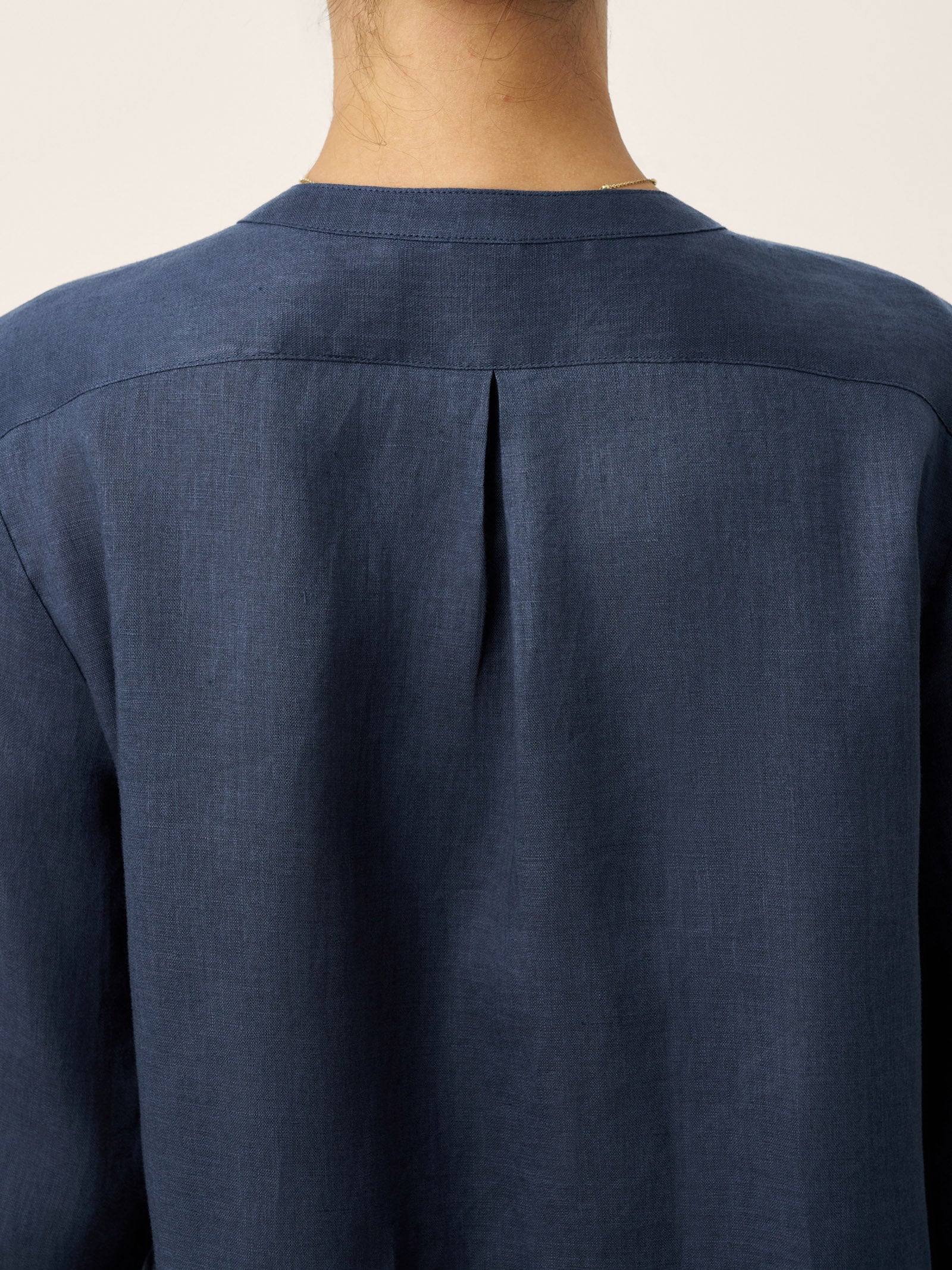 LINTICO 100% Linen Sculpted Accordion Pleat Crew Neck Shirt RANA — in-use photo