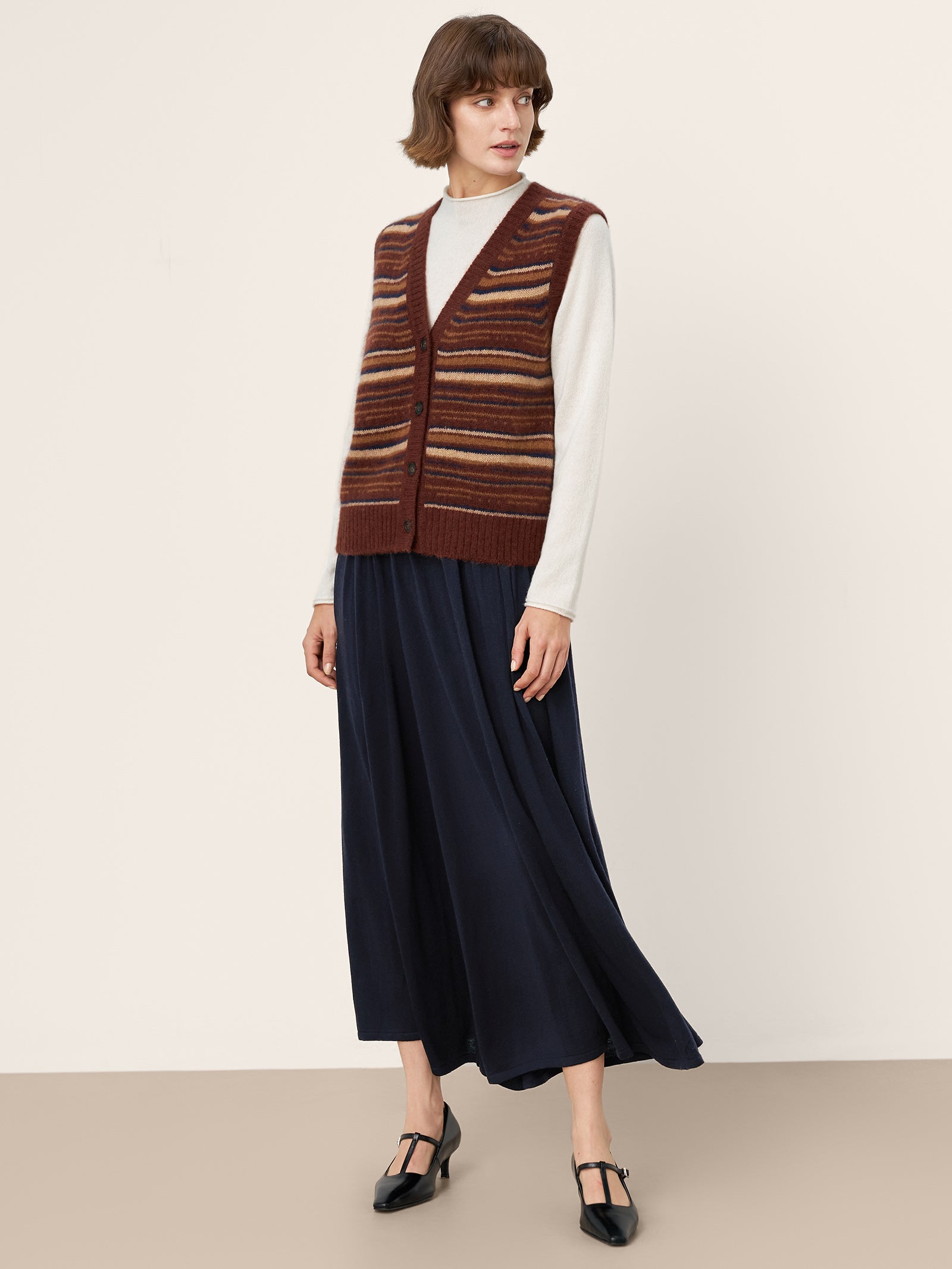 LINTICO Mongolian Cashmere and Mulberry Silk Colorblock Stripe Button-Front Vest SOPHIE — lifestyle worn / used context