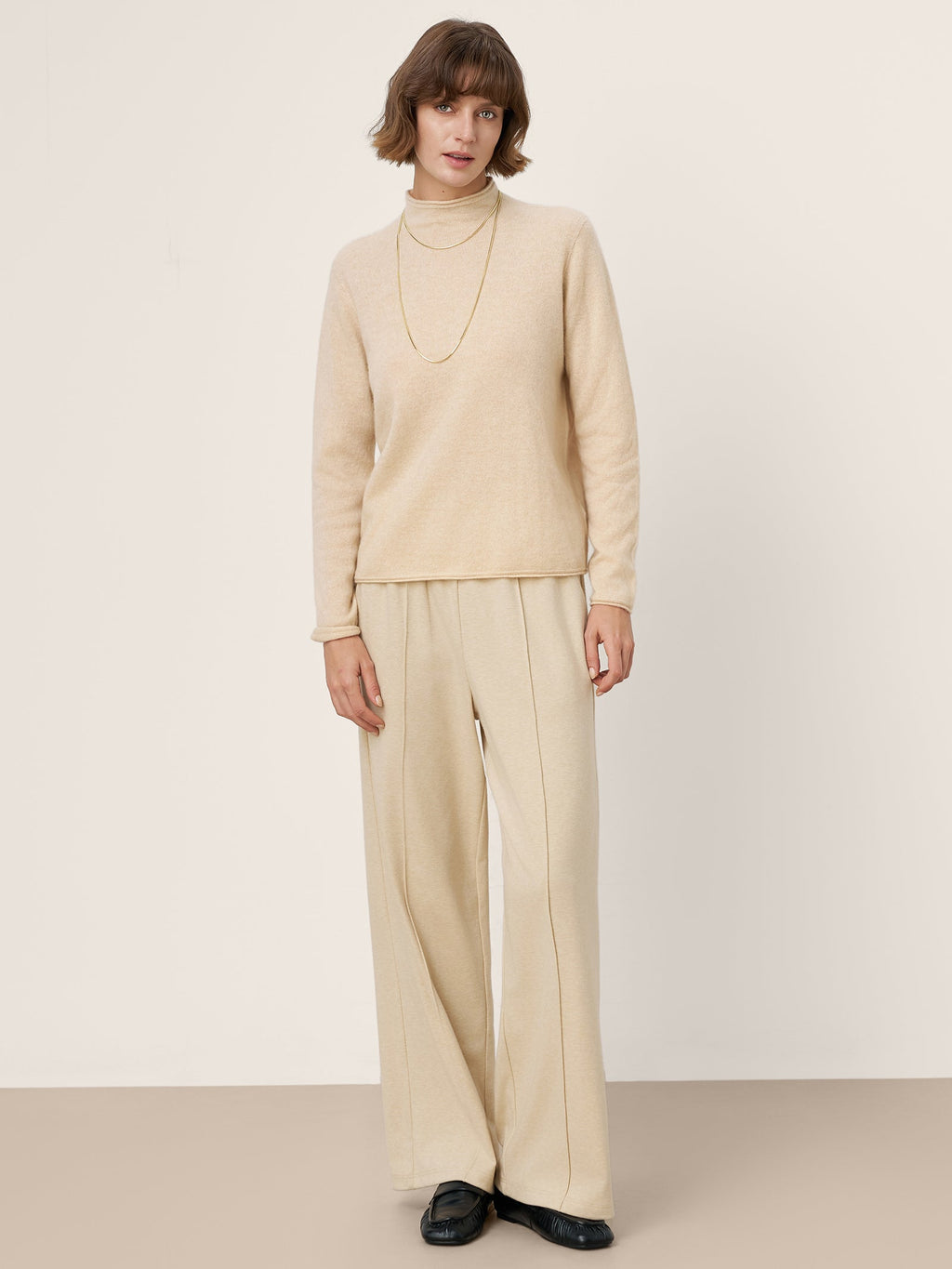 LINTICO Premium Cashmere Blend Hand-Finished Seamless Mock Neck Lettuce Edge Sweater ZELIE — fabric or material detail