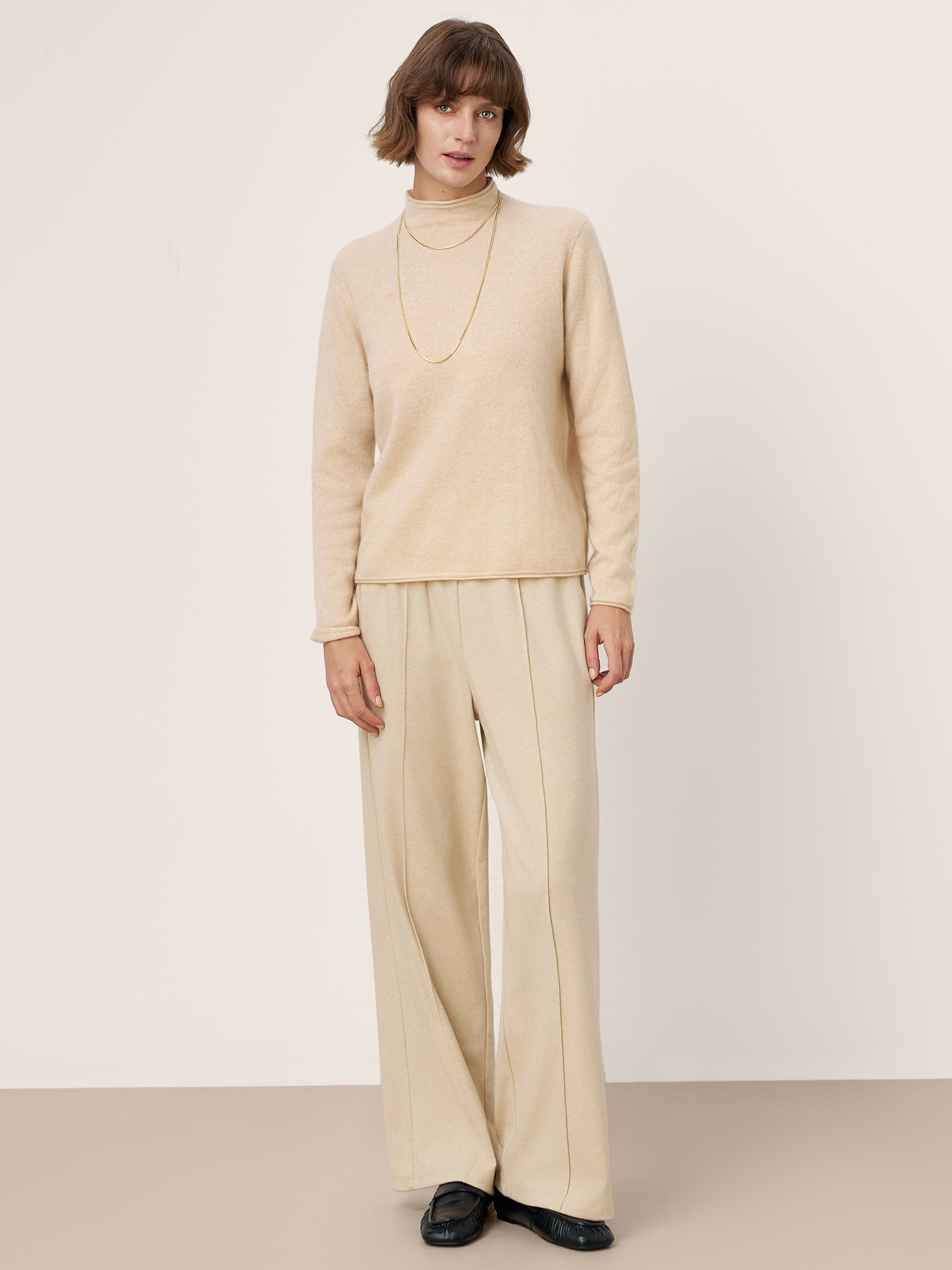 LINTICO Premium Cashmere Blend Hand-Finished Seamless Mock Neck Lettuce Edge Sweater ZELIE — fabric or material detail