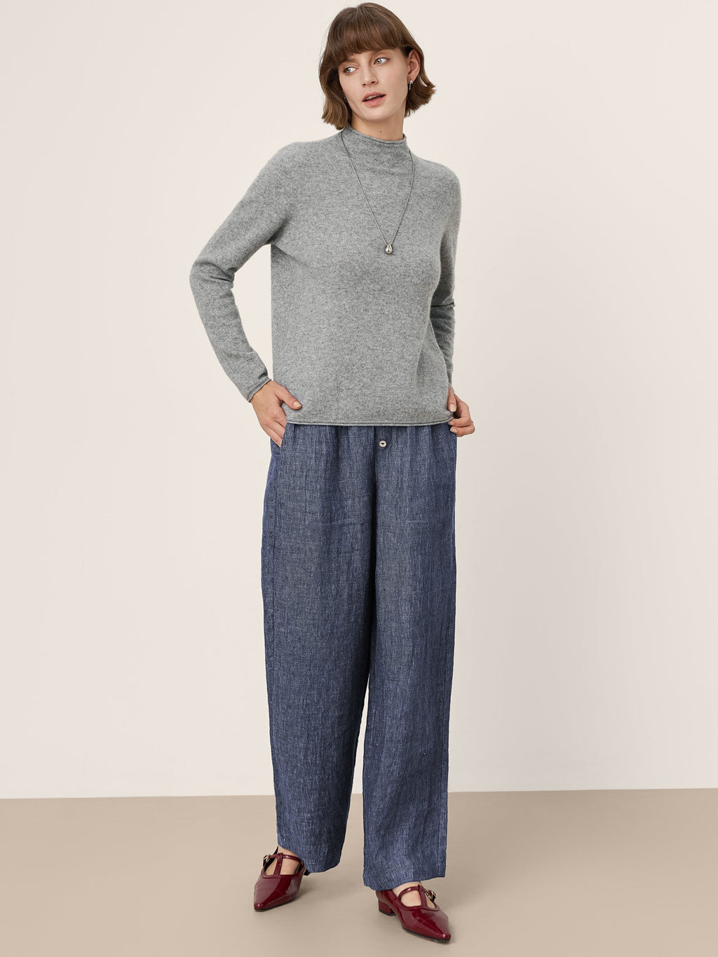 LINTICO Premium Cashmere Blend Hand-Finished Seamless Mock Neck Lettuce Edge Sweater… — lifestyle worn / used context