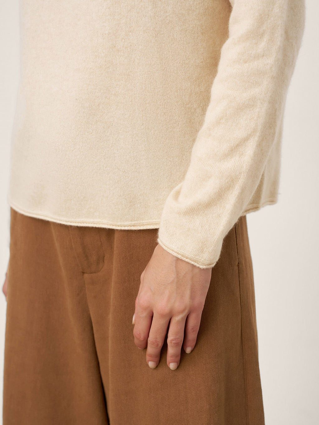 LINTICO Premium Cashmere Blend Hand-Finished Seamless Mock Neck Lettuce Edge Sweater ZELIE — product on model