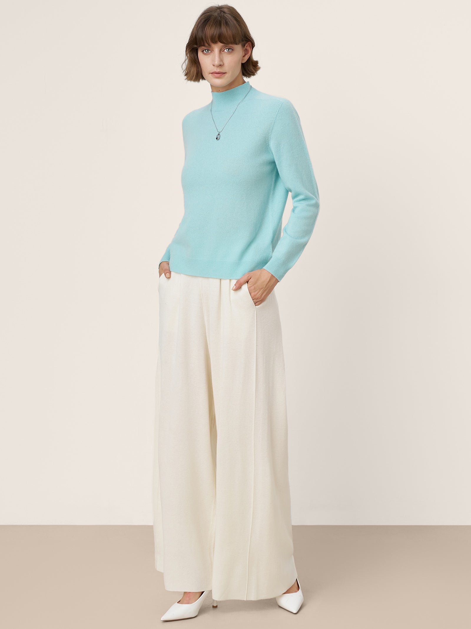 LINTICO Premium Cashmere Blend Hand-Finished Seamless Mock Neck Ribbed Sweater RHEA — lifestyle worn / used context