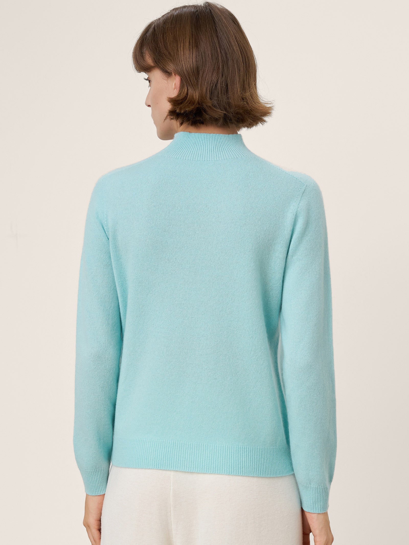 LINTICO Premium Cashmere Blend Hand-Finished Seamless Mock Neck Ribbed Sweater RHEA — LINTICO branding close-up