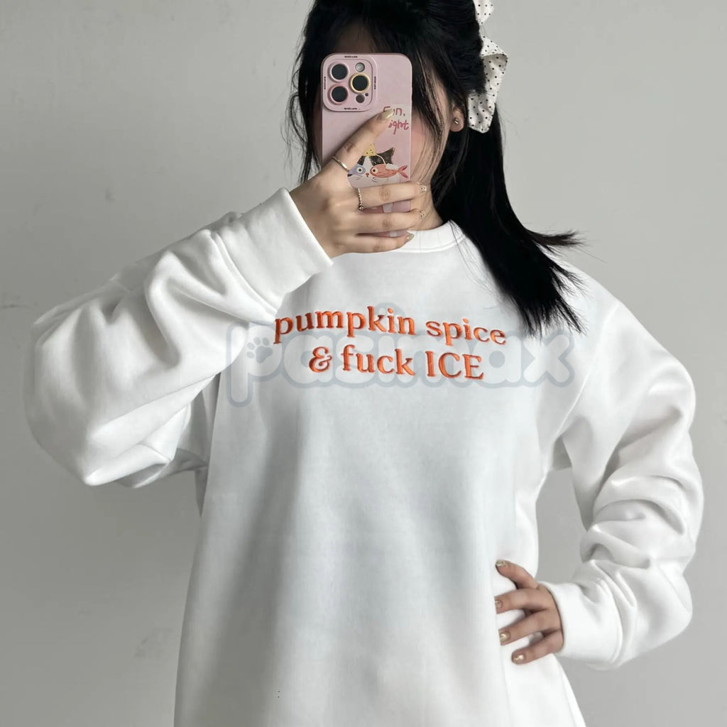 Pasimax Pumpkin Spice & Freedom Embroidered Sweatshirt – Support Immigrant Families Crewneck — detail close-up