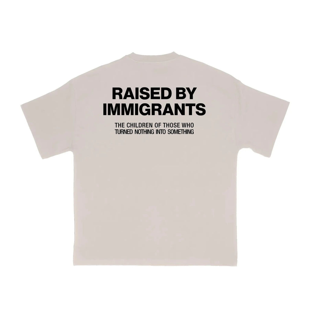 Pasimax "Raised by Immigrants" Statement Tee — detail close-up