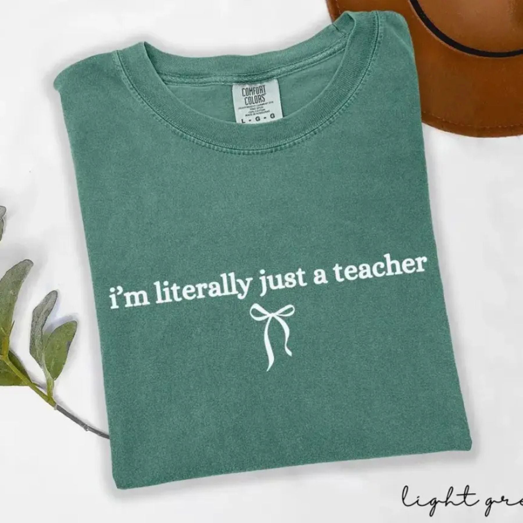 Pasimax 'I’m Literally Just A Teacher' Shirt — detail close-up